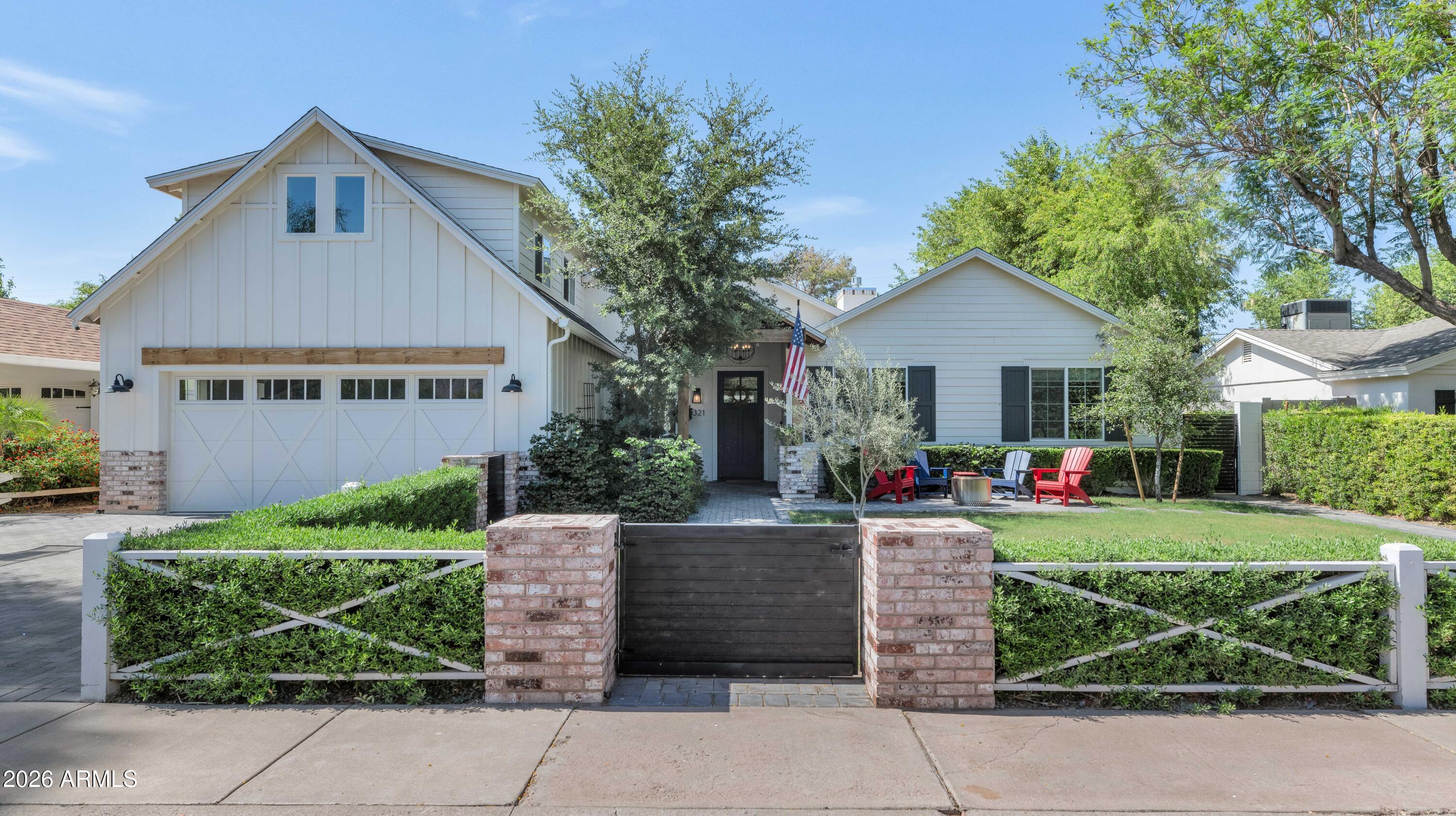 Located in one of Arcadia's most beloved neighborhoods, this move-in ready home offers the perfect combination of style, functionality, and outdoor living in a premier location close to top schools, dining, and recreation.This exceptional 2020 built residence blends modern design with everyday livability. Offering 3,622 square feet, the thoughtfully designed split floor plan features 4 bedrooms, a private office, and an upstairs loft ideal for a game room, media space, or kids' retreat. Vaulted ceilings and expansive living spaces create an open feel, while the chef's kitchen serves as the heart of the home. Large sliding glass doors open to a resort-style backyard designed for Arizona living, complete with a sparkling pool and mature, private landscaping.Also detached 370sf gym!