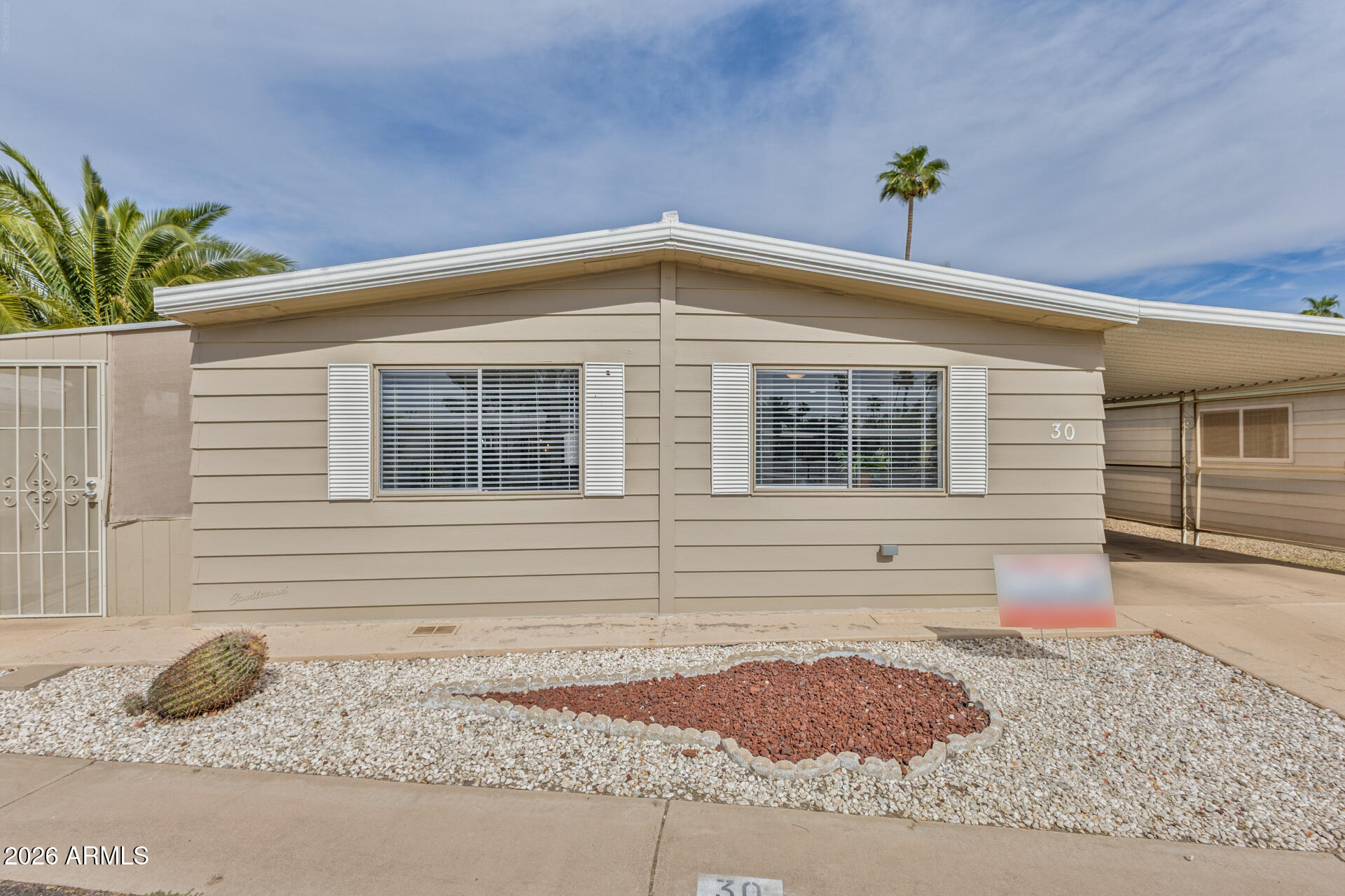 Discover our cozy DOUBLEWIDE manufactured home located in the PREMIUM GATED community of Brentwood West. Boasting a 24×52 sq. ft. layout, this charming residence features 2 comfortable bedrooms and 2 bathrooms, perfect for relaxing and entertaining. Enjoy the sunroom, custom showers, a convenient carport, and a handy storage shed. Plus, it is located in front of a peaceful walking lake, offering a serene and picturesque setting for residents to enjoy. Turnkey and move-in ready! Brentwood West offers fantastic amenities including a swimming pool, clubhouse, spa, sauna, horseshoes, bocce ball, shuffleboard, billiard room, library, laundry facilities, fitness center, Wi-Fi and boat/RV storage -- all designed to enhance your lifestyle.