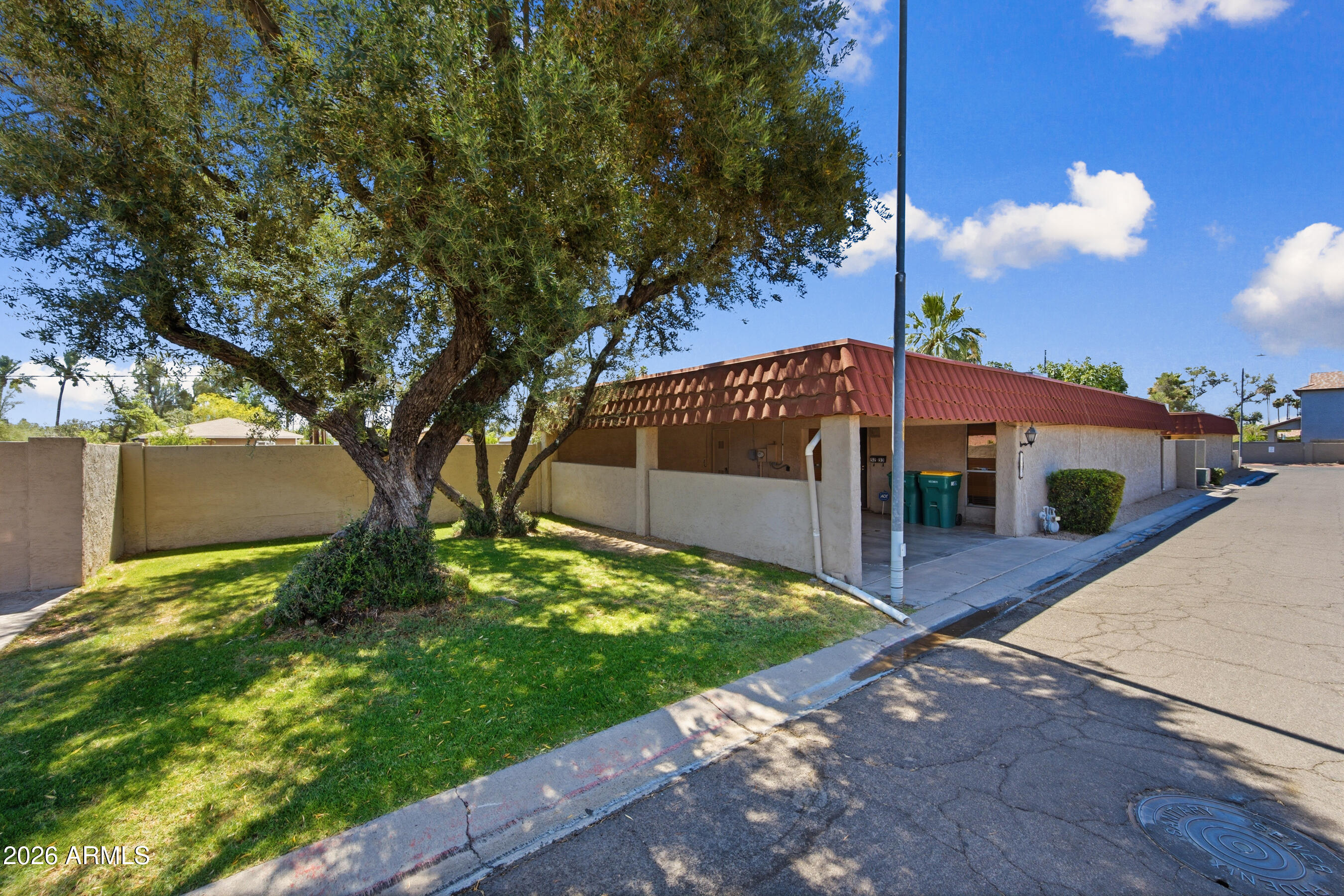 Welcome to the quaint single-story community of Casa Maya - this townhome is fully detached & shares NO walls with any other home which is a very RARE find!  Backyard features two mature citrus trees offering wonderful shade & a sweet snack.   This home has been tastefully updated over the years with manufactured wood flooring, updated kitchen featuring an oversized island perfect for entertaining, bathrooms & plumbing.  A/C unit is only 2 years old!  All appliances stay along with washer/ dryer, soft water system & filtered water at the kitchen sink.  The floorplan makes perfect use of the space where each bedroom is a very comfortable size & the common living area flows seamlessly from the kitchen to the living area.   Pool is the ideal distance from the home to make fun in the sun easy