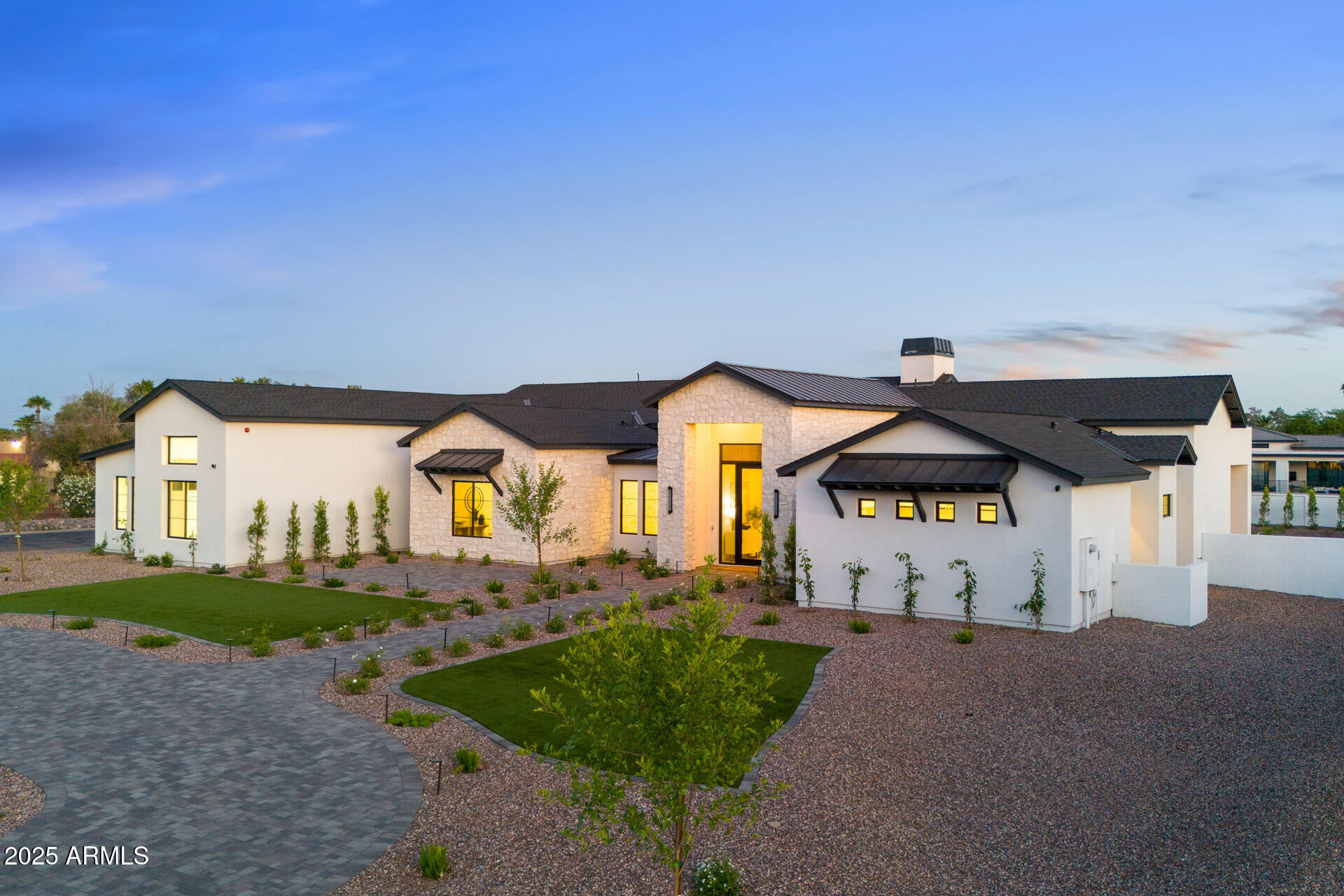 Step into a world of refined elegance with this brand-new luxury estate in Scottsdale. Boasting 5 spacious ensuite bedrooms, 7 designer bathrooms, large Office and a detached guest house, this home offers the perfect blend of sophistication, comfort, and functionality. The lot sits perched on a corner three quarter-acre lot, the outdoor living space is a true entertainer's paradise. Enjoy year-round relaxation with a sparkling pool with Baja Shelf, soothing spa, and an expansive covered patio with built in BBQ ideal for hosting gatherings or simply unwinding in style. Inside, every detail has been meticulously curated—from the open-concept living areas to the gourmet chef's kitchen, working pantry and luxurious ensuite bedrooms. The guest house provides privacy and flexibility, perfect for extended family or visiting friends. Located in one of Scottsdale's most sought-after large lot neighborhoods, this exceptional residence combines the tranquility of a private corner lot retreat with proximity to world-class dining, shopping, and golf. This is Luxury living redefined. Book your private tour today & ask about the special home features and specifications list for details about the quality of the build and materials used.