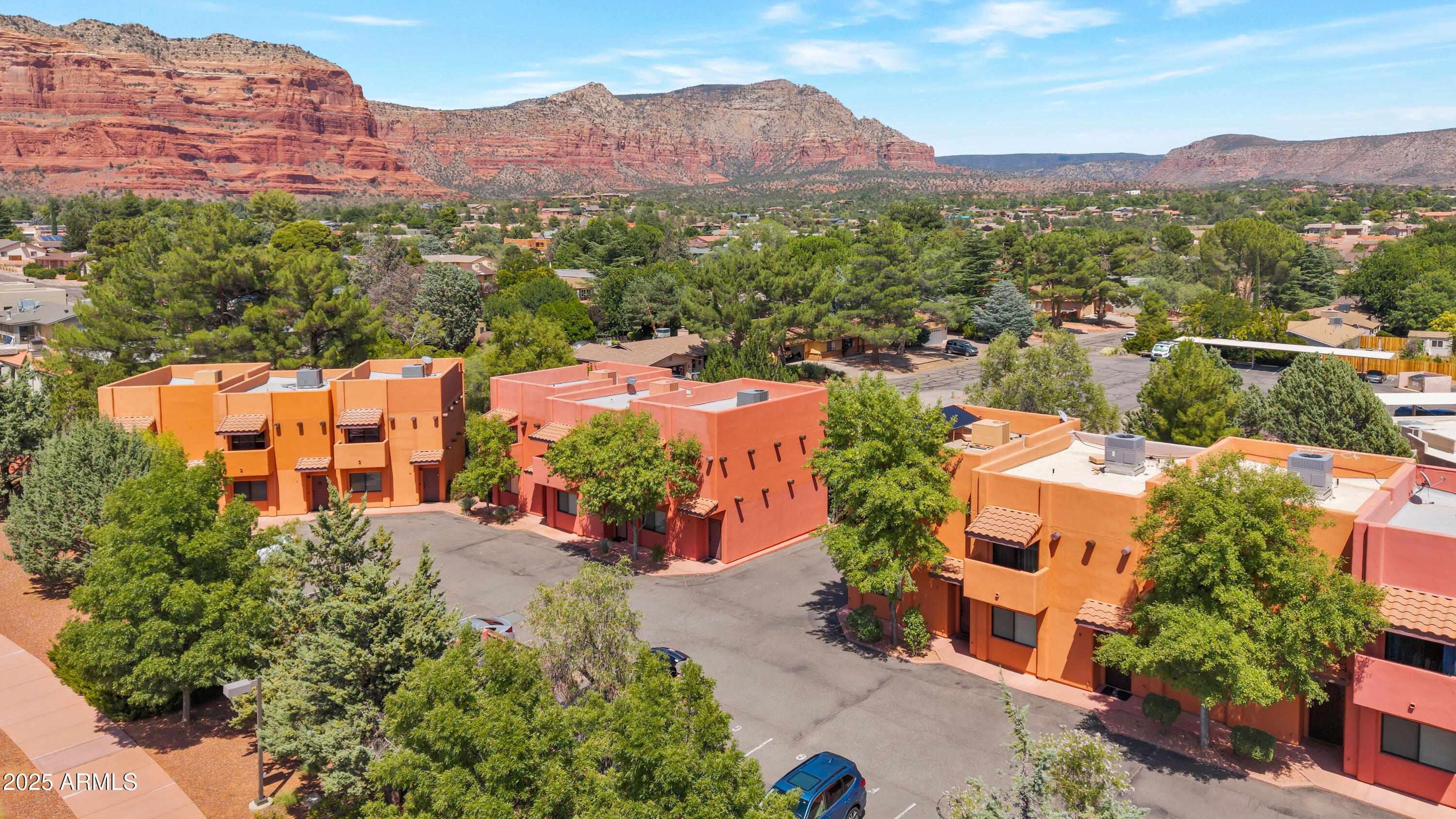 Turnkey Sedona Investment Opportunity - Bell Rock Vista Townhomes

Discover a rare chance to own one or two charming vacation rental units in the heart of Sedona's Village of Oak Creek—one of the area's most popular visitor hubs. Located at 45 Canyon Diablo Rd, Units D & E, these fully furnished townhomes are income-ready from day one, with the flexibility to rent individually or together for larger groups, families, or wedding parties.

For the past nine years, these units have been successfully operated on VRBO and Airbnb, building a proven track record with 565 guest reviews and an average rating of 9.8 out of 10. If you are buying for vacation rental use, you're stepping into a business with an excellent reputation and loyal repeat guests(properties have bookings until February 2026 that will transfer to new owners).

The Village of Oak Creek is a magnet for year-round tourism, offering endless hiking and biking trails, yoga studios, and refreshing creekside activities. Guests can also enjoy world-class golf at Sedona Golf Resort and Oakcreek Country Club, along with local coffee shops, art galleries, boutique shopping, and acclaimed restaurants just steps away.

Inside, each unit boasts a fully equipped kitchen that flows effortlessly into a spacious living room, creating a welcoming space for entertaining or relaxing. Sliding doors lead to inviting patios with shaded seating perfect for outdoor dining or unwinding beneath the trees.

A significant advantage of this property is its commercial zoning. Unlike many residentially zoned properties, these townhomes are classified the same as a hotel. 

Upstairs, two master suites in each unit open to private balconies with serene views, offering guests a tranquil retreat after a day of exploring Sedona's Red Rocks. With easy parking, a stellar rental reputation, and a prime location in one of Sedona's most sought-after destinations, this property is both a secure, high-performing income producer and a lifestyle getaway.

Whether you're seeking reliable ROI, a second home in Sedona, or bothBell Rock Vista Townhomes deliver.