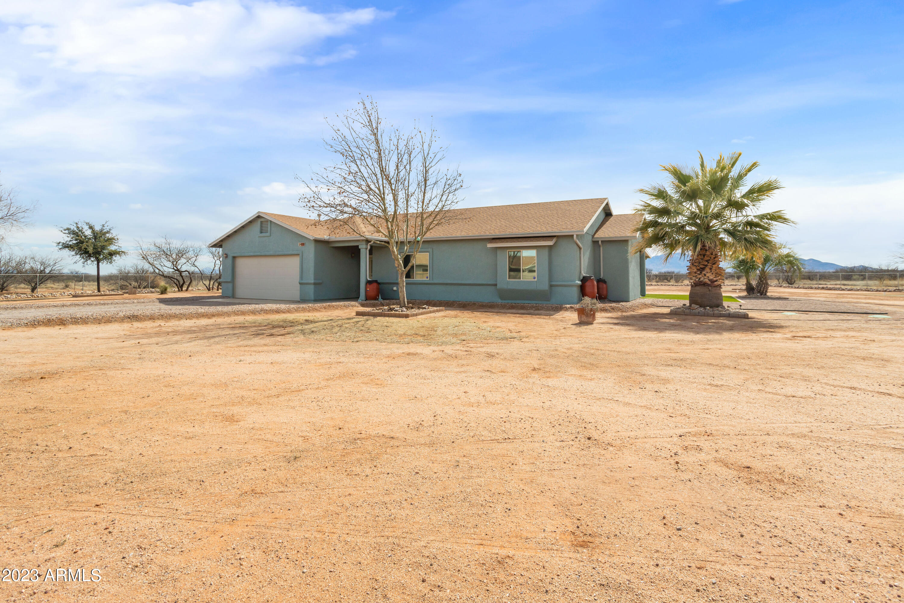 Back on Market at no fault of seller or home!!!
Enjoy this beautiful home sitting on just shy of 1 acre and backing up to government land.  3 bedroom 2 bath home with an open floor plan. Home has owned water softener system and irrigation for the trees in the back yard. Enjoy beautiful views from your covered patio and the quiet of this location. Call today for your private showing.