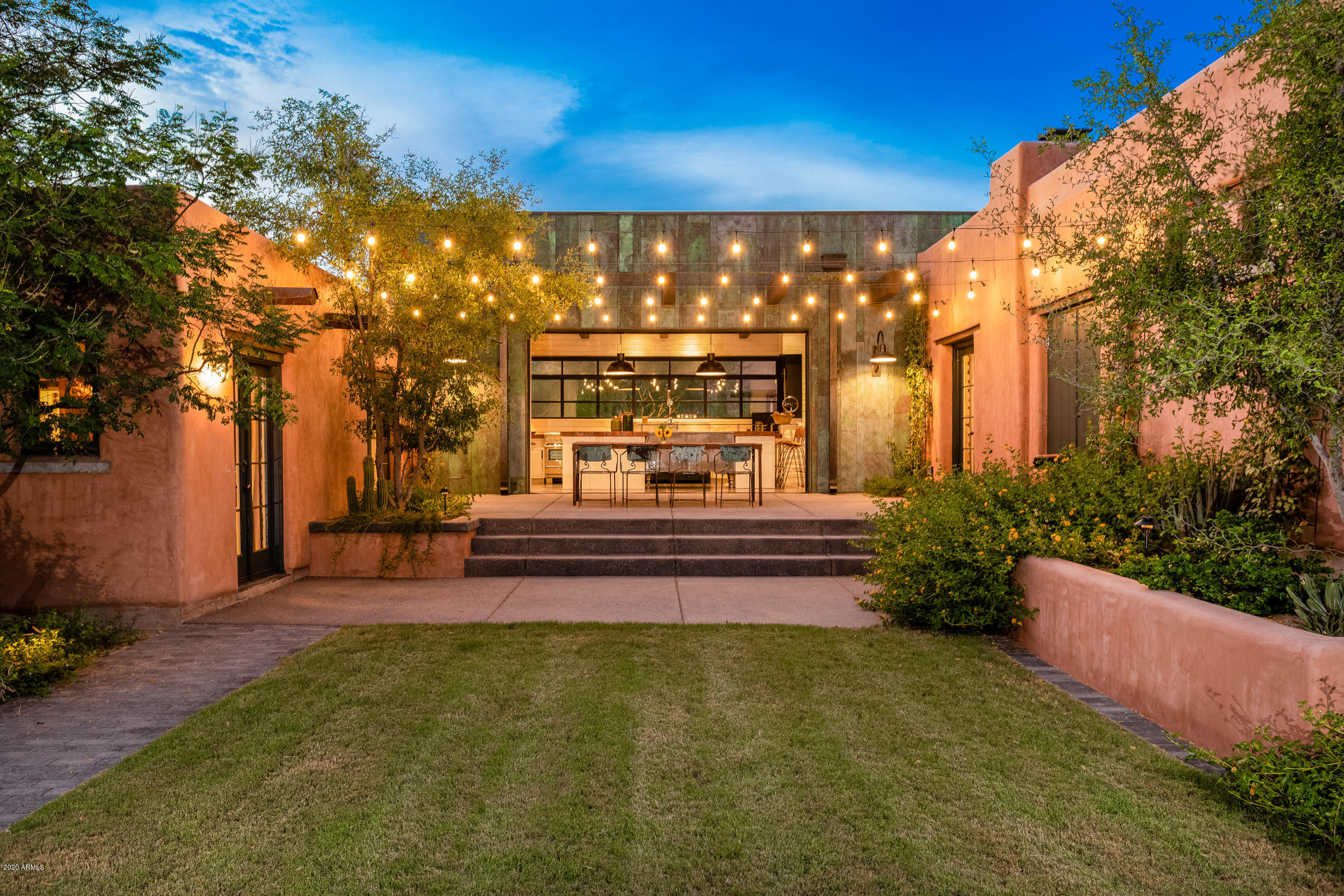Love new but want charm? This Award Winning Adobe in the Heart of PV offers stunning design, TOTALLY remodeled in 2019! Restored to capture 1920's feel, updated to 21st century Luxury! 1.35AC lot: private gated compound W/ 5br home, 1br guesthome, roof deck, resort-style pool, oversized 3g w/shop/storage, mtn views. Cook's kitchen-pro-style appliances, retractable glass doors. Owners-suite blends historic w/modern:en-suite bath, W/I closet w/bonus W/D. Living Room w/room for piano, Lrg Dining w/butler pantry includes D/W, bev/wine fridge+ice. Split-plan includes a guest BR, family room/lounge area that opens to the back yard, resort style pool, ''bunk-house'' wing w/2br/sitting area, bath. 6 fireplaces, patios, fire-pit, B/I BBQ area, garden, WOW! Enter and leave the world behind you! MORE Nearly New/Recent Renovations and Additions: This Award winning Adobe home in the heart of Paradise Valley features a total renovation and stunning architectural updates, making it one of the most unique homes available today: a once-in-a-lifetime opportunity to own a nearly 100-year-old adobe home nestled in the midst of its own desert botanical garden with views of fabled Camelback Mountain, the Phoenix Mountain Preserve and Piestewa Peak.

Originally a 1928 adobe guest ranch, this charming complex of adobe structures was named "La Casita de Maria" by the original owners. Today this very special home has been totally renovated, expanded and restored to perfection, most in the last year. 

UPDATED THROUGHOUT! This home was recently reimagined and totally remodeled  faithfully restored to capture its history yet fully improved to include most 21st century amenities. Hidden away in Paradise Valley, this one-of-a-kind home is private, secluded, and secure. Yet, it's only 12 minutes from Sky Harbor International and minutes to freeway access, restaurants and shopping. 

Enter this home and you've left the cares of the world behind you. "La Casita de Maria" is unique unto itself: a place to truly call home! 

Located on a pristine, 1.35 acre desert parcel with outstanding mountain views, you'll enjoy a gated and private compound that offers a five bedroom home, separate one bedroom guesthouse, complete with roof deck, resort style pool and an oversized three car garage with shop and storage. This casa has enough patios - one for every day of the week - for easy indoor-outdoor Arizona living/entertaining. 

The heart of this magnificent home is the newly added kitchen, a stunning design that blends old with new, certain to meet the demands of any chef with its Pro 48 Sub-Zero refrigerator, Thermador six-burner, griddle, steam oven and warming drawer range, dishwasher, Miele "plumbed" coffee maker, convenient trash compactor, microwave, and two sinks. 

It becomes a special gathering place and a unique connection between original adobe structures. Retractable glass doors pocket open to sheltered patios for generous entertaining. Or pull up to the eat-in kitchen breakfast bar. Cozy informal dining area next to the kitchen includes gas fireplace and relaxed seating.

The owners-suite is a charming blend of historic and modern, featuring a contemporary bath with oversized shower and a very generous closet. Enjoy a cozy sitting area, and gas fireplace; en-suite bath includes a "private" water closet, dual vanity and sinks, large master shower with digitally controlled dual shower heads; the closet houses a convenient washer/dryer combination, one of three washer/dryer locations within the home. 

Living Room/Salon has room for a baby grand piano, remote controlled gas fireplace, and opens onto patios with Camelback Mountain views. Dining room easily accommodates eight and is perfect for entertaining. It opens onto its own patio for al fresco dining. The attached butler pantry houses its own under-counter dishwasher, soda fridge, ice machine, and wine chiller.

The split plan includes a stunning guest bedroom opening to it's own patio, a family room/lounge area with gas fireplace that opens to the back yard, and a resort style swimming pool. The family room is the gateway to the home's main laundry room, garage, convenience "kitchen", and the "bunk-house"; a two-bedroom suite that includes a sitting area and bath, plus enough room for ranch hands of every description.

There is a one-bedroom detached guest house compete with walk-up roof deck in the territorial style of its day. Site amenities, gas/wood burning fire-pit, 2 barbecue grills, view deck, gardening area, and garage parking for three cars with shop, storage and additional washer/dryer hook-up.

This award-winning adobe home offers all the charm of 1920's Arizona with the updated modern flair, reliability and luxury of today. Schedule now to view this amazing home by appointment to qualified buyers, you may never want to leave!

Renovation Architect (2019): Brent Armstrong AIA, ISOS Architecture