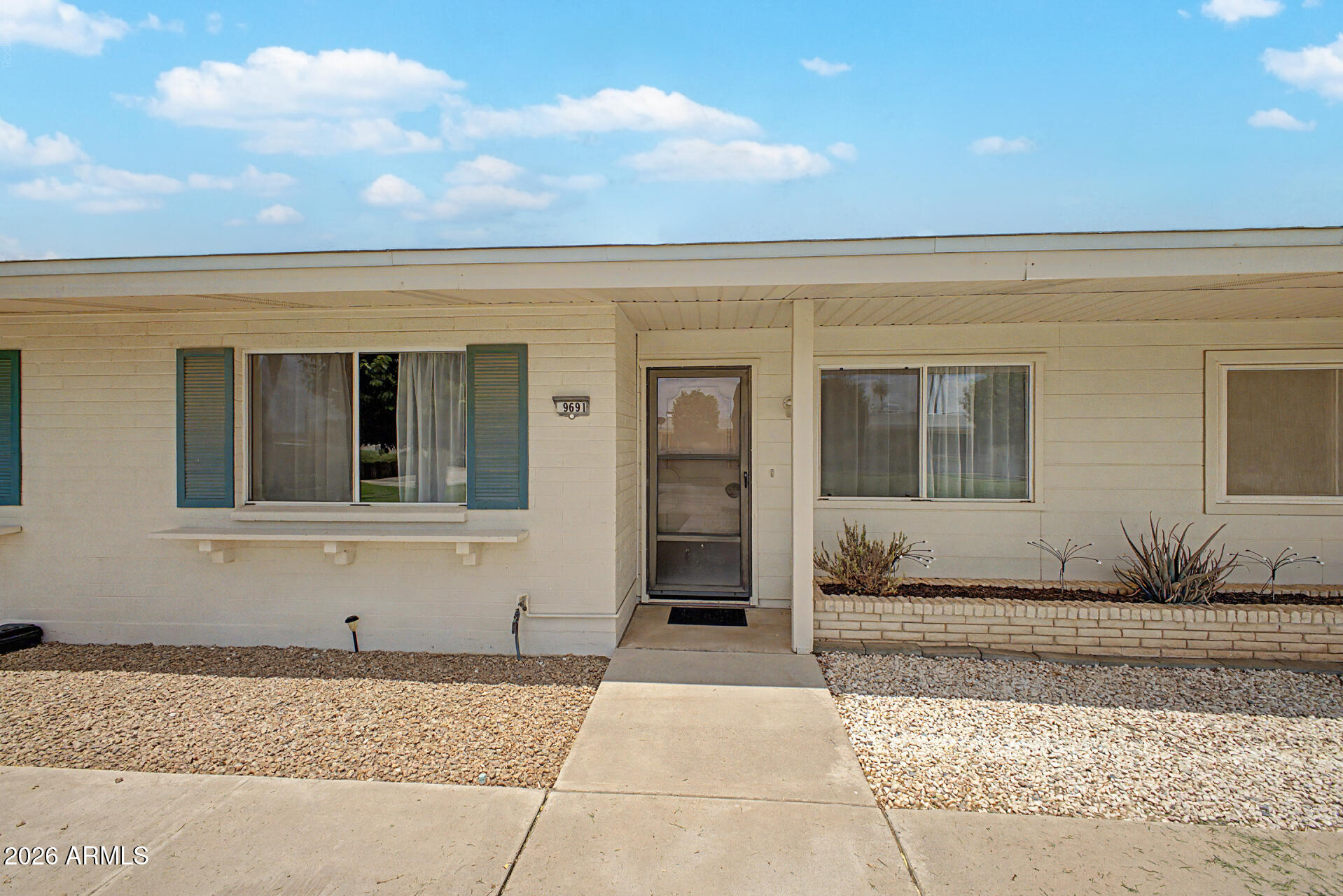Clean, comfortable, and move-in ready, this home offers the perfect amount of space for one or two people. The property has been professionally cleaned, including the carpets, making it ready for immediate occupancy. A large entertainment center is available to stay with the home or can be removed if desired.Kitchen cupboards have handy pull out shelves for easy access.  Enjoy all that Sun City has to offer, with recreation centers, golf courses, fitness facilities, clubs, arts and crafts, social activities, and countless opportunities to stay active, meet new friends, and enjoy the Arizona lifestyle.
