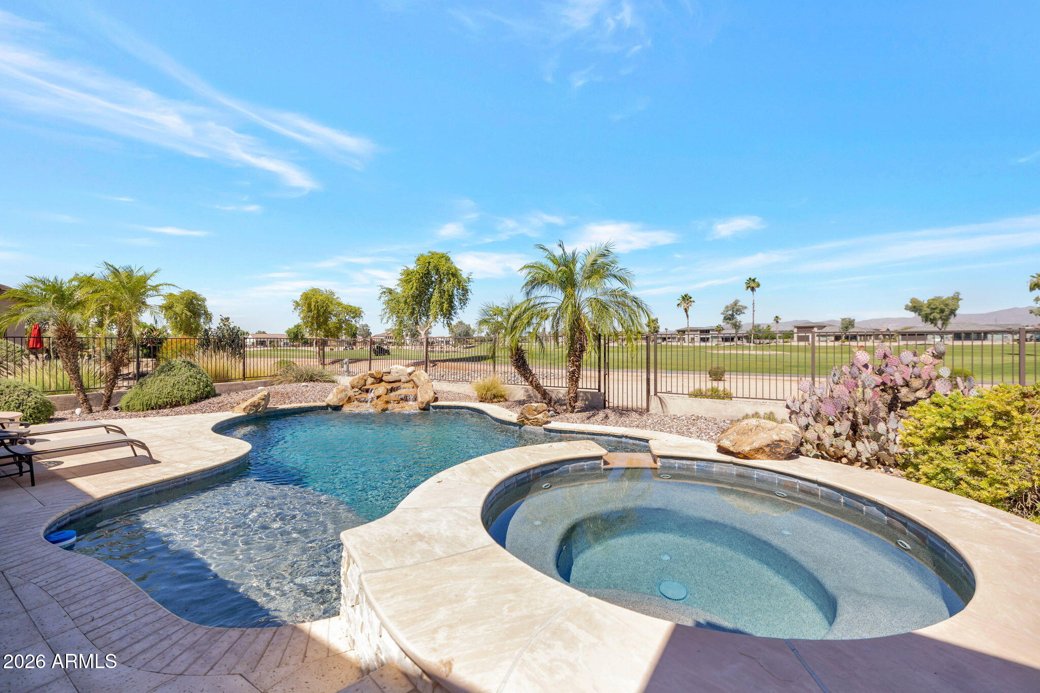 Absolutely fabulous and prestigious. This is a rare combination of 3 bedrooms, 3.5 baths, with all bedrooms having ensuites. This beauty sits on a golf course lot overlooking the 10th and 18th fairways of the Tuscany West course. This spectacular home also features a pool with spa. Pool has its own solar unit for low-cost operation. Right from the time you drive up to this gem you'll note the outstanding curb appeal and custom iron gate leading to the custom front door. Once inside take note of the generous sized rooms thru-out. Home has just received new carpet, paint and most of the lighting thru-out. Enjoy the great outdoor space featuring a a large grilling station. This one will be sold.