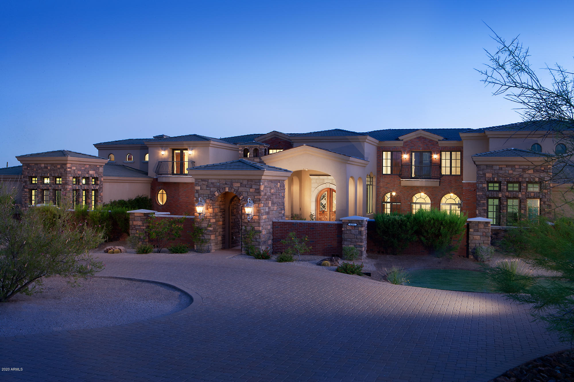 Unique opportunity to own this 37.63 acre gated compound with three magnificent and near new luxury homes. The sale includes 2 additional parcels APN # 216-70-012 6.49 acres with a 9,368/sf home and APN# 216-70-011 4.77 acres with a 8,050/sf home. The main parcel has 26.63 acres with 8,870/sf home (that has never been lived in) a 2 bedroom guest house, a 4,500 recreation/pool house that features a theater & commercial kitchen, plus a huge pool with water feature and lazy river. This parcel (26.63  acres) could be subdivided into 4 additional 4.5 acre lots leaving approx 8 acres for the home and other improvements to rest on. The compound has a gated guard house entry. Utilities include city sewer, gas and electric. Being sold only as a complete package at a fraction of its cost.