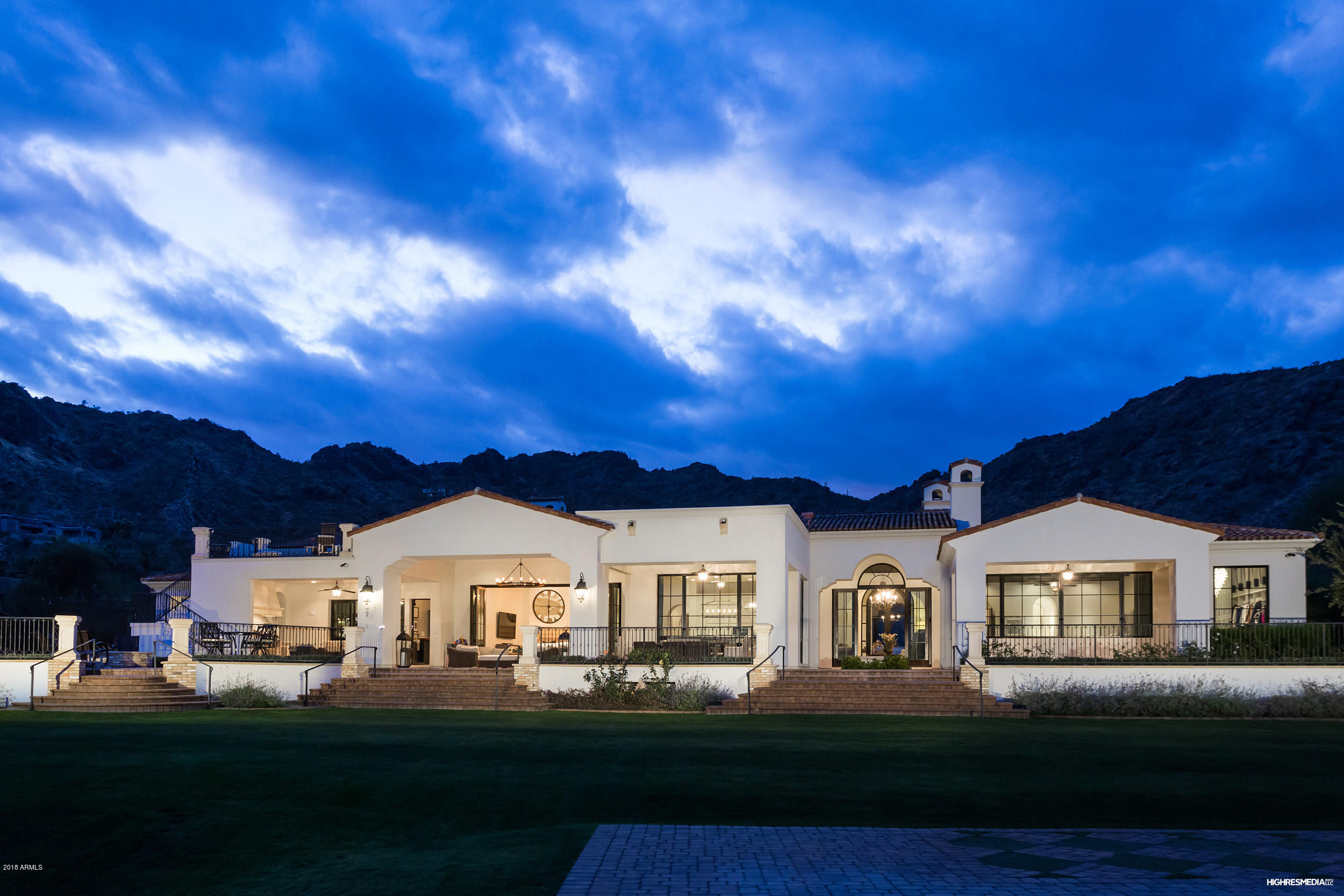 HUGE PRICE REDUCTION! Picturesque Panoramic Views in all directions of this gated estate home. Builder and designers personal home. Words simply can't describe this home with expansive patios, sprawling grass, large 1.46 acre lot, oversized 5 car garage with extended height. Every Room uniquely captures a view of either mountains or city lights. The detail put in to the home will amaze and astonish you. This is a very hard to find non hillside lot in PV with city lights, mountain views and a large yard. A very private and secluded retreat!