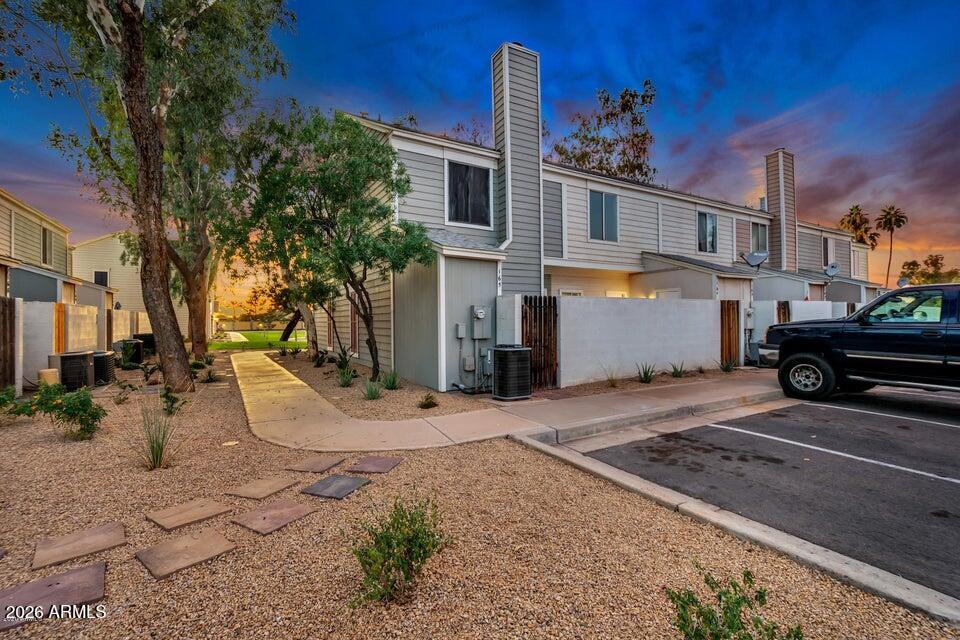 Beautifully Remodeled 2BR Gem in the Heart of Chandler! Welcome to 1600 N. Saba #164  a stylishly updated 2 bedroom, 1.5 bath home offering modern comfort and low-maintenance living in one of Chandler's most convenient locations. Step inside to durable tile flooring throughout the main living areas and plush new carpet in the bedrooms. The kitchen shines with gorgeous stone countertops, stainless steel appliances, and a tile backsplash that ties the whole space together. The primary bath features a stunning walk in tiled shower for a spa-like feel every day.  Beyond the unit, residents enjoy access to a  community pool perfect for beating the Arizona heat. Situated close to major freeways, shopping, dining, and top Chandler schools, this home puts everything you need within easy reach