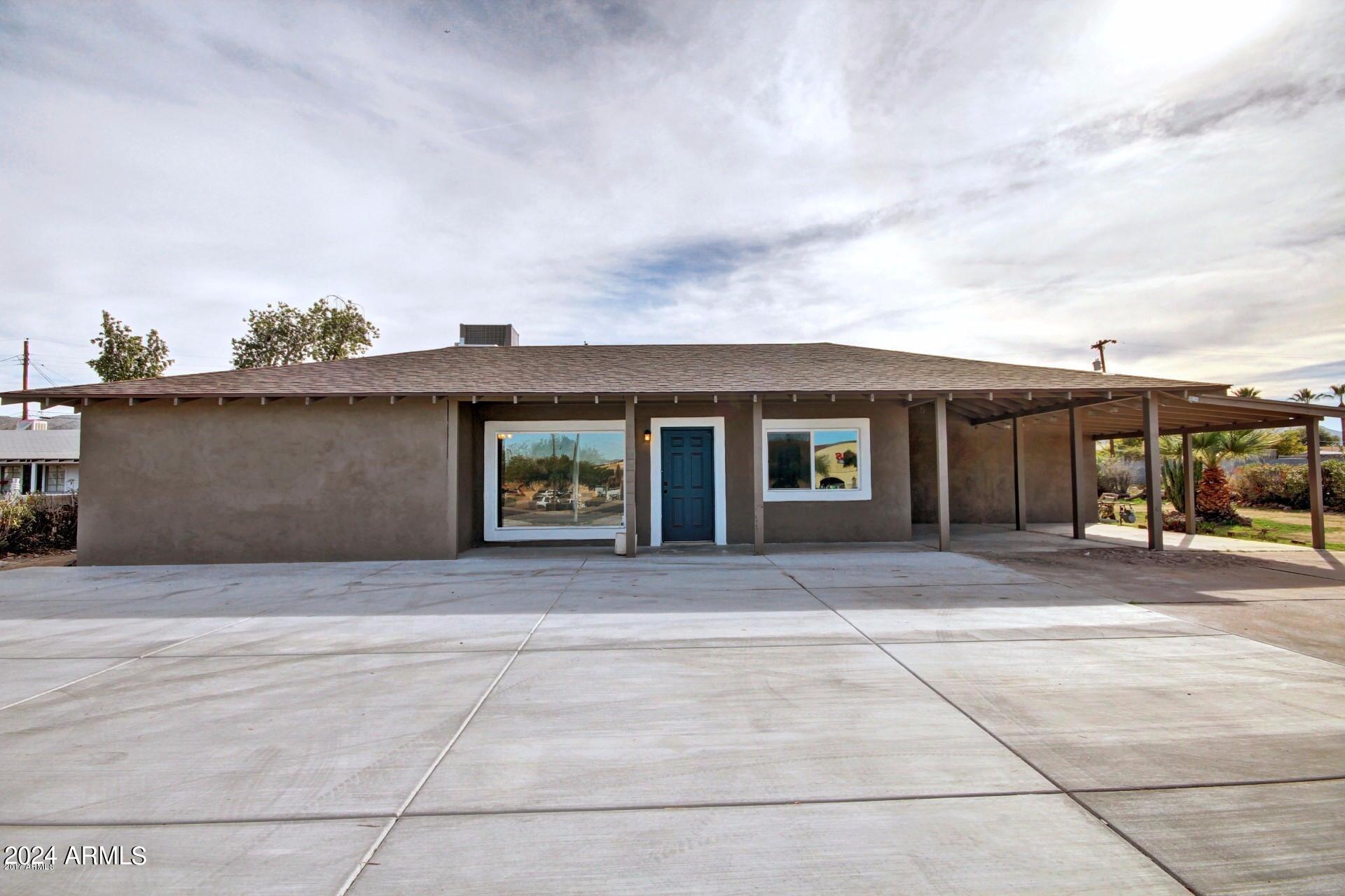 Fantastic future commercial property, great for small business owners looking to expand out of their home. Light rail will open in late 2024 or early 2025. 
 Own your commercial property at the perfect location.  Spacious lobby area for receiving clients and plenty of natural lighting. Several private rooms available, plus a kitchenette area with plenty of storage cabinets and a half bath. Plenty of front parking spaces up front. Open, unused space in the back. On a large lot with plenty more space for any additions your business needs. Buyer responsible for obtaining Certificate of Occupancy or change in zoning.