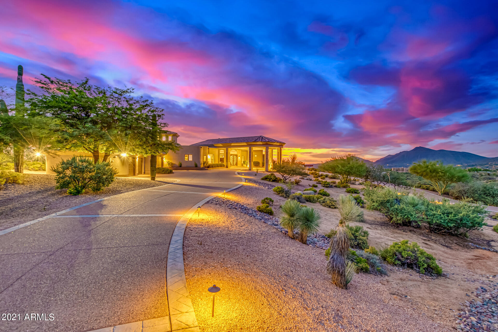 Prestigious private & gated Quail Ridge North Scottsdale. Custom luxury 5800 SF single level luxury home sits atop 5+ACRES parcel of prime view property. Enjoy the 360-degree views mountains & city lights in the most private settings. 4 car climate controlled garage & room to add garage + guest house. Massive chef's kitchen & open flowing split floor plan. Sky high soaring ceilings!  All 3 guest bedrooms en-suite baths. Luxurious master suite with dual walk-in closets & private living room & fireplace & private patio breathtaking views. Gorgeous fireplace in great room for those chilly winter nights @3400 FT elevation. Stroll along the sprawling wrap around patio & soak it all in. Beautiful negative edge pool & spa. * VIEWS* CITY LIGHTS & MOUNTAINS & GOLF COURSE VIEWS* 
Majestic luxury!