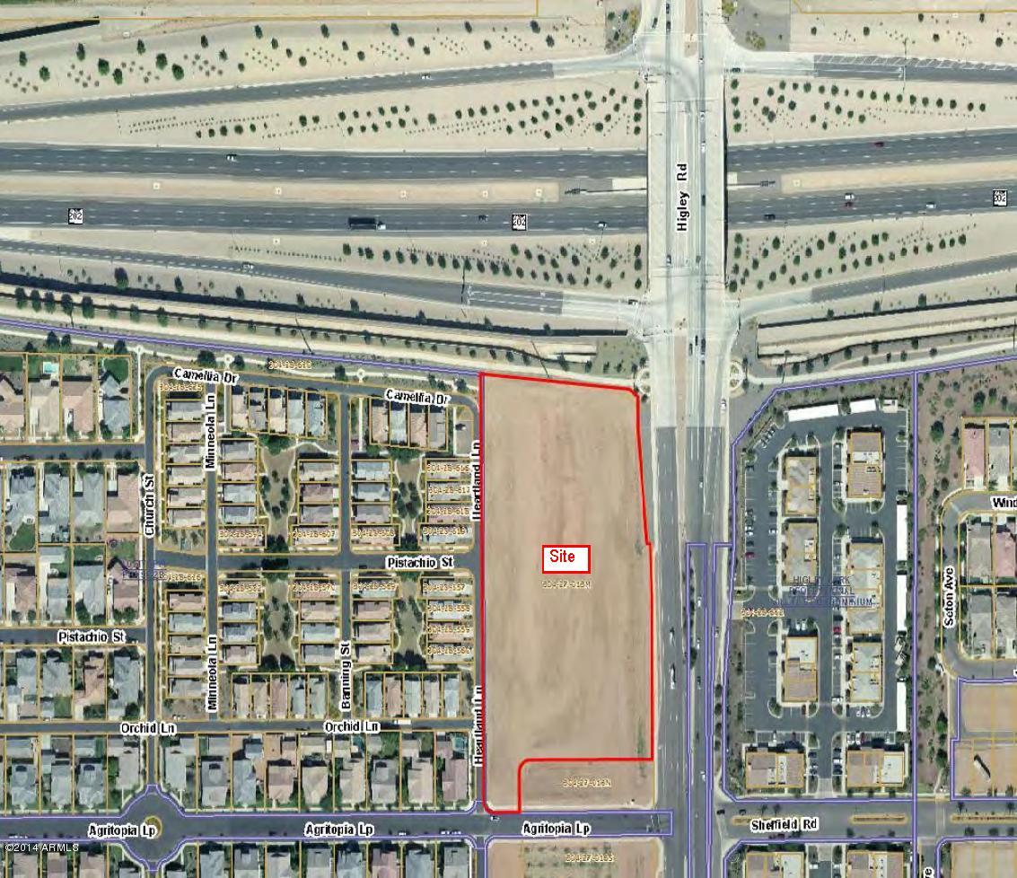 Freeway interchange land for sale in Gilbert, AZ. General Commercial (GC) Gilbert, AZ Zoning Ordinance #2364 - Mix Use Commercial including Residential Lofts and/or Work Units, Retail, Hotels, Medical, and Office.  55 feet height on most of the site.  Very unique signage is allowed, including marquee signage and vernacular architecture, and the site has reduced setbacks for better planning.  The land is part of Agritopia Master Planned Community. Note the loft units are a residential unit above a nonresidential use.  Master HOA fees to be calculated and supplied during escrow. Owner currently uses the land to grow citrus trees to be conveyed with land at close of escrow.