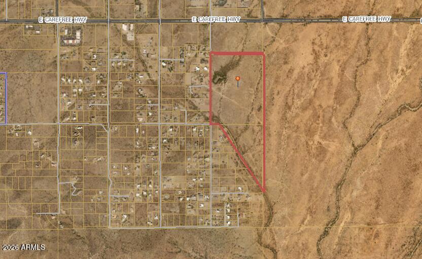 Desert Hills Ranch is a 74 AC +/- site which is perfectly located adjacent to State Trust Land and Sonoran Mountain Ranch.  TSMC only minutes away. The natural landscape will make for an amazing new home subdivision.  You will be in awe of the stunning mountain and desert views.  Most properties are 1 AC+/- sized lots which lends to a Rural feel yet the Metro Phoenix area is less than 30 Minutes away. Close to Lake Pleasant, Cave Creek / Carefree, Norterra and Desert Ridge Marketplace.  Currently 35K lots are allowed by an 35K RUPD overlay and maintain the 1 DUA per AC.  Listing included APN #s 211-74-109 A, B, C, D & E and 211-74-092P.  Assured Water Supply from the Town of Cave Creek may be available. **Buyer to perform their own due diligence on water**