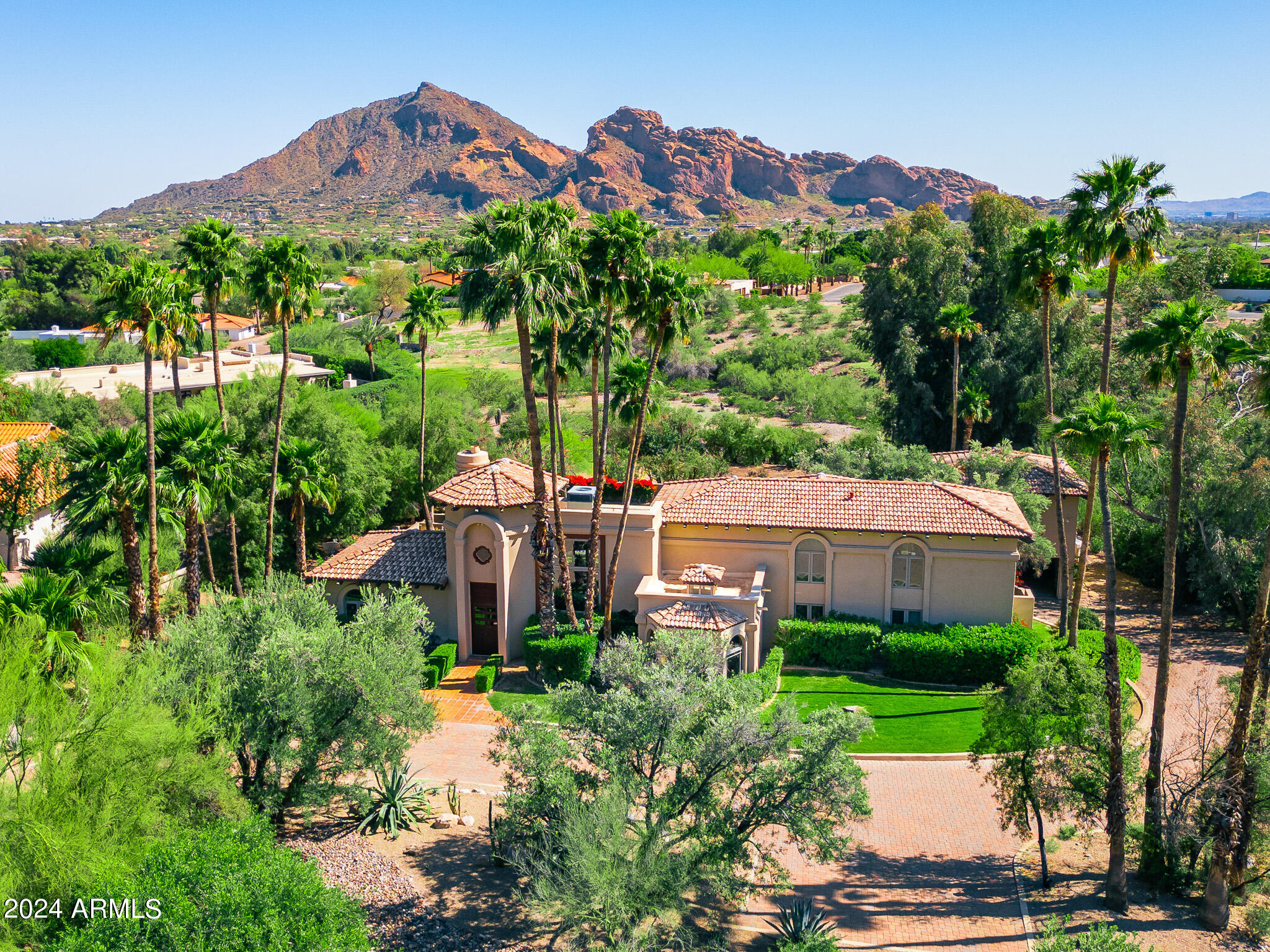 Welcome home to 4709 E Clearwater Parkway in beautiful Clearwater Hills. This unique Spanish style villa in the heart of Paradise Valley has been lovingly maintained throughout the years.  Upgraded kitchen, bathrooms, flooring, etc.  lend itself to amazing views of Camelback Mountain.  One bedroom Casita over the detached garage makes for a beautiful pool house.