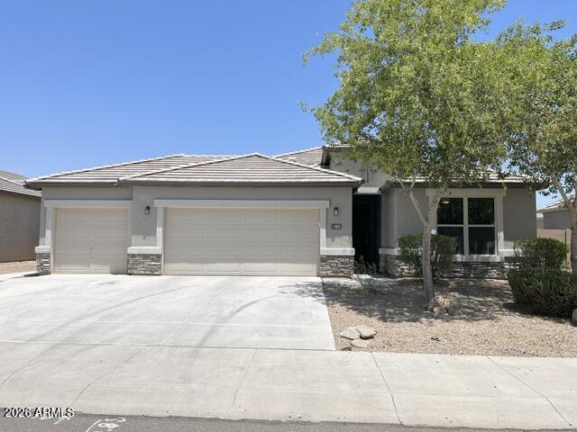 Bright open floor plan with 4 bedrooms and an office that can also be used as a bedroom or game room. Three full bathrooms.  Wood plank tile flooring in living areas.  Granite and updated fixtures in kitchen with pull out drawers in lower cabinets.  Stainless appliances.  Gas stove/cooktop.  Master bath has huge walk in shower.  Backyard has an extended patio slab and is fully landscaped .
3 car garage has attached cabinets and two overhead racks for storage.  TWO YEAR MIN LEASE.