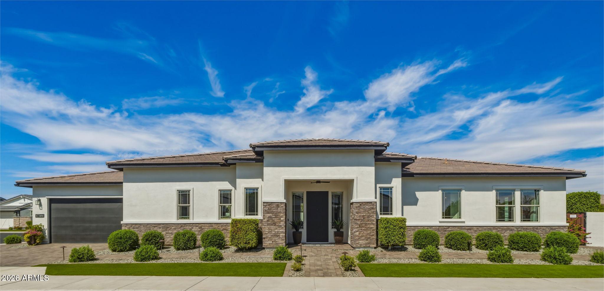 AVAILABLE NOW AT STERLING GROVE GOLF & COUNTRY CLUB IN SURPRISE, ARIZONA IS THIS IMMACULATE MIDWOOD PRAIRIE ON WILDWOOD STREET!  

LOCATED IN THE AGE-RESTRICTED PARCEL AT STERLING GROVE. 

THIS BEAUTIFUL HOME , PROFESSIONALLY INTERIOR DESIGNED, IS FILLED WITH STUNNING STRUCTURAL AND DESIGN UPGRADES INSIDE AND OUT!  VAULTED CEILINGS WITH BEAM, GREAT ROOM OPEN FLOOR PLAN, 24X24 ARIZONA FLOOR TILE PIETRA ITALIA, GORGEOUS LIGHTING THROUGHOUT, AND SO MUCH MORE!  *PLEASE TAKE THE TIME TO REVIEW THE STRUCTURAL AND UPGRADED DESIGN OPTIONS LIST.  THANK YOU! LET'S TAKE A LOOK AT THIS AMAZING CHEF'S KITCHEN WITH BUILT-IN DOUBLE WALL OVENS, MICROWAVE AND GAS COOKTOP.  KITCHEN ISLAND WITH DELICATUS WHITE GRANITE COUNTERTOPS, MINERAL STAIN KITCHEN CABINETS WITH UPGRADED ELEGANCE PACKAGE.  KITCHEN PERIMETER COUNTERTOPS AND BACKSPLASH IS WHITE QUARTZ.   RECLAIMED WOOD ACCENT WALL-KITCHEN ISLAND AND CUSTOM WALK-IN PANTRY.

SPACIOUS PRIMARY SUITE WITH CUSTOM WALL CLOSET, CUSTOM WALK-IN CLOSET AND CUSTOM LINEN CLOSET.  DESIGNER LIGHTING AND WINDOW TREATMENTS.

CUSTOM BARN DOORS LEADING INTO PRIMARY BATHROOM EQUIPPED WITH HIS AND HER VANITIES AND A SPA LIKE WALK-IN TILED SHOWER!

ENSUITE BEDROOM #2 WITH FULL BATH, SHOWER TUB/COMBO AND GOLF VIEWS OF THE 11TH GREENS!

PRIVATE ENTRANCE CASITA WITH FULL BATH AND CUSTOM WALK-IN CLOSET. 

RELAX OUTBACK IN YOUR REFRESHING POOL (HEATED) AND ENJOY THE OUTDOOR LIVING SPACE WITH A LARGE EXTENDED COVERED BACK PATIO, OUTDOOR KITCHEN AND DINING, GREAT FOR  ENTERTAINING YOUR FAMILY AND FRIENDS!

Sterling Grove Golf & Country Club is a Gated Community w/24 Hour Guard Post. Great Opportunity to Enjoy on a daily basis so many Wonderful Amenities and Beautiful Views of the White Tank Mountains, Lakes, Ponds and Gorgeous Greens on your Walks, Jogs, Bike Rides!

Amenities: TROON Managed Jack Nicklaus Design 18 Hole Golf Course, Tennis Courts, Pickleball Courts, Country Club, Swimming Pools, Fitness Center, Spa, Restaurants, and Much More!

Come See For Yourself!