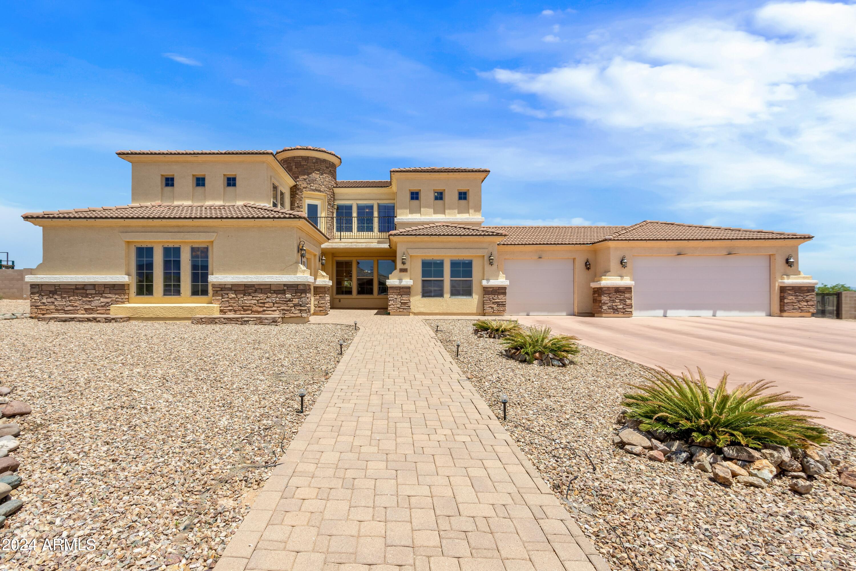 Palatial 6 bedroom, 3 bathroom, oversized 3 car garage home with private pool & spa, outdoor kitchen on private lot is a custom build ready to be yours!  The interior features a beautiful kitchen with granite countertops, stainless steel appliances, breakfast bar, eat in kitchen area, 2 secondary bedrooms on the first floor, full bathroom, spacious living room, oversized formal dining room that has enough room to accommodate an additional living space, curved wall staircase, 4 bedrooms on the 2nd floor (including primary), a roomy balcony off of the primary bedroom, which also features a luxurious bathroom,  included on the second floor is an additional full bath and laundry room.  Do not miss the oversized 3 car garage and large driveway pad!  MOUNTAIN VIEWS!