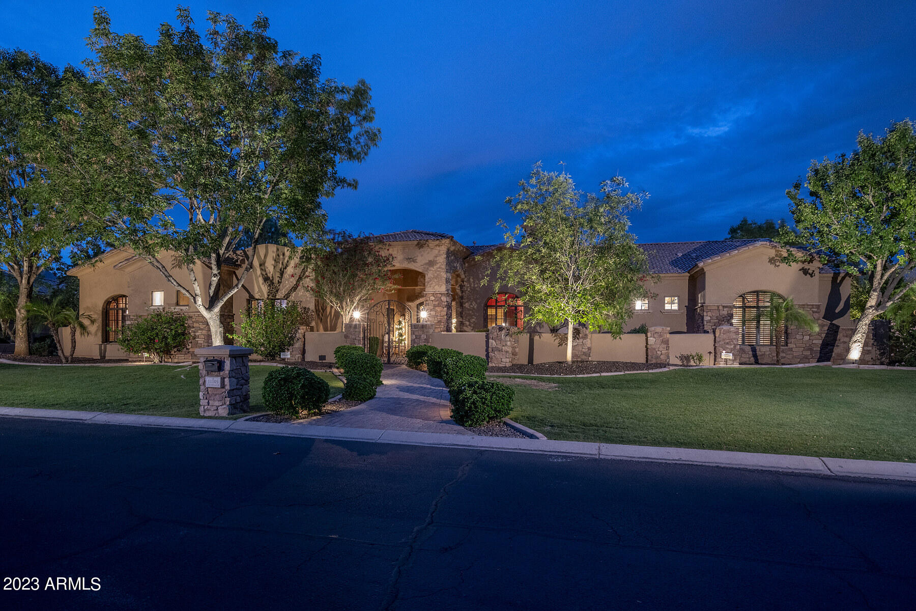 Discover an extraordinary gem nestled within the exclusive gated community of Ranch Santa Fe. This magnificent 5-bedroom residence effortlessly combines elegance, comfort, and a thoughtfully designed floor plan. Every detail, from the soaring ceilings to the exquisite custom cabinetry, wood-clad windows, and captivating MacKenzie-Childs tile accents, has been meticulously crafted to create a truly remarkable home.

Indulge in the seamless harmony of indoor and outdoor living as the disappearing doors reveal an incredible outdoor sanctuary. Entertain guests or enjoy tranquil evenings with loved ones in the open-concept gourmet kitchen, which effortlessly connects to the family room. A second family room/game room with built-in desks provides a versatile space, flanked by three generously sized secondary bedrooms, each boasting an ensuite bath and walk-in closet - a haven for children or guests.

This impeccable residence offers an array of luxurious features, including a beautiful powder room, a separate office with a closet, and an opulent owner's suite with separate closets
 and water closets. The chef-inspired kitchen is a culinary masterpiece, complete with rich cabinetry, top-of-the-line Wolf and Subzero appliances, and a seamless granite-topped island. The family room includes a wet bar with wine and drawer refrigeration, as well
 as an ice maker.

A formal yet inviting living and dining space opens gracefully to the patio, inviting the outdoors in. The expansive 4-car garage not only provides ample parking but also includes a large separate storage closet. Step outside to discover a captivating patio area, adorned with Canterra stone floors, a cozy gas fireplace, a BBQ area, and even a sport court. The beautifully landscaped grounds embrace the morning sun and seamlessly flow to a stunning pool featuring a full Venetian tile interior, custom turtle inlays, a raised hot tub, mesmerizing water features, a spacious play/lounge area, and an offset diving spot with a 10' deep end.

This idyllic retreat offers ultimate privacy while remaining an ideal setting for year-round entertainment. Conveniently located just minutes away from premier schools, upscale dining establishments, and renowned shopping destinations in Scottsdale, this home encapsulates the epitome of luxury living.