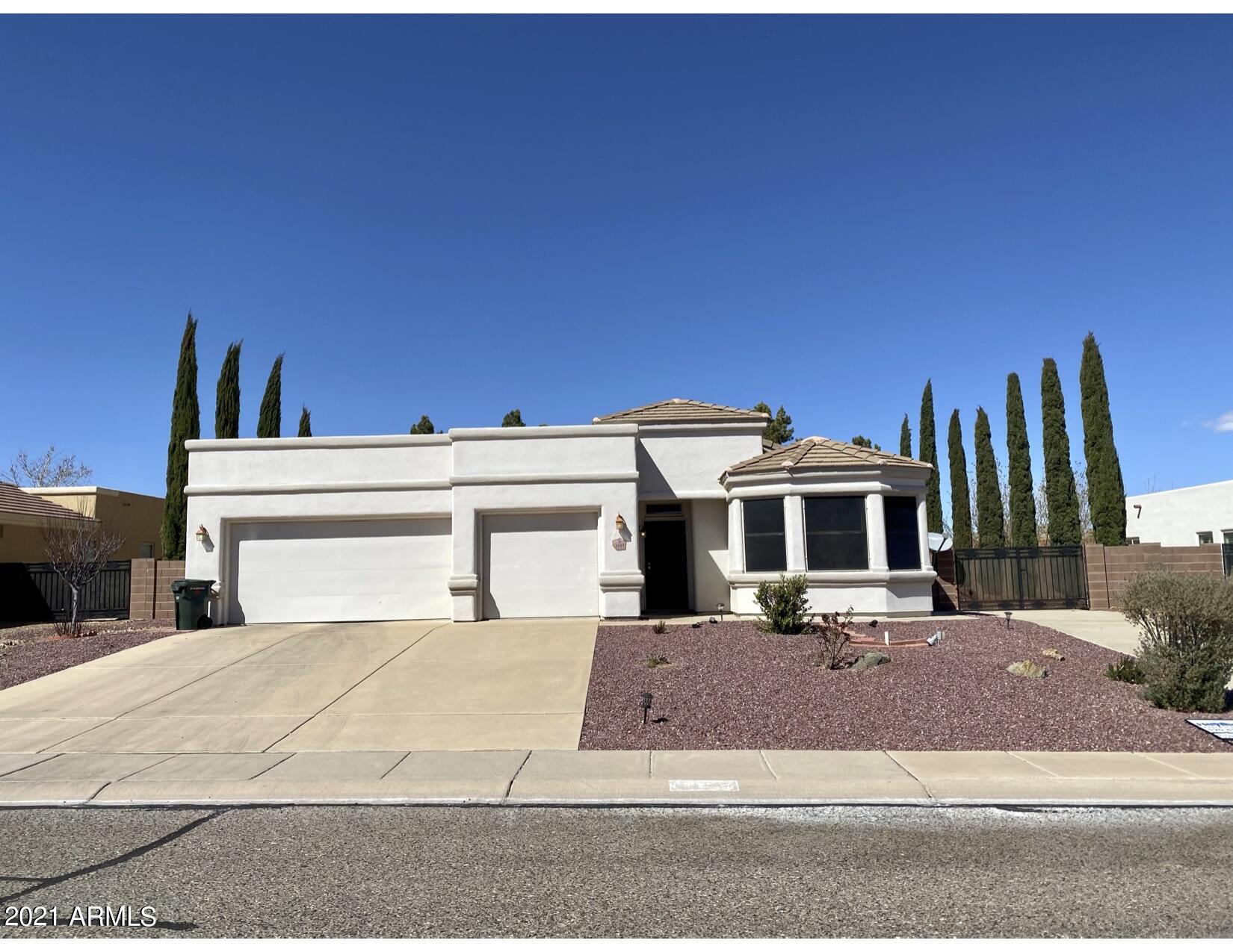 Well maintained home in established neighborhood close to shopping and easy access to Ft Huachuca. 3-car garage plus RV parking. Open concept floorplan with beautiful plantation shutters and corner gas fireplace in the family room. Extra space for Den/Office. Large open kitchen with plenty of counter and cabinet space. 3bed/2bath split floor plan home ready for it's new owners! Mature trees and low maintenance backyard offers plenty of entertaining space and privacy. Won't last long!!