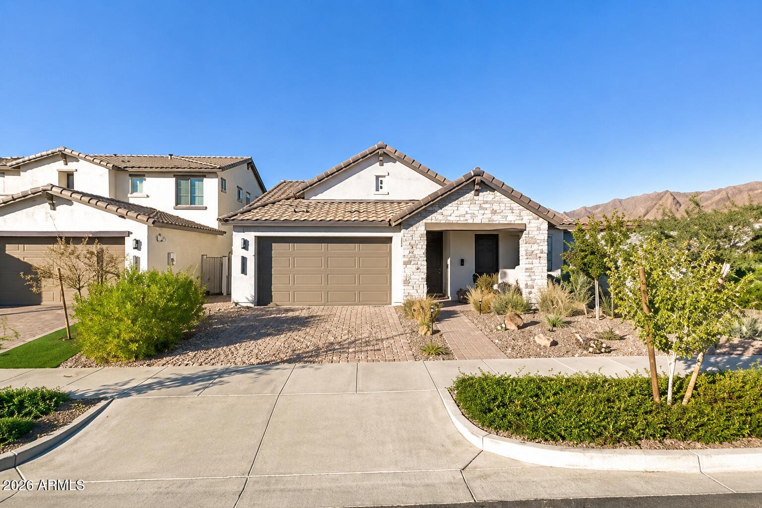 Welcome to Eastmark living at its finest. Built in 2020, this thoughtfully designed single-story home offers the perfect blend of comfort, style, and everyday convenience. Located in one of Mesa's most sought-after master-planned communities, this home delivers an inviting layout with open living spaces and carefully designed areas for both gathering and relaxation.

The kitchen serves as the heart of the home, seamlessly connecting to the dining and living areas to create a space that feels both functional and welcoming. Whether you're entertaining guests or enjoying a quiet evening at home, the flow of the home makes everyday living effortless. Step outside and enjoy Arizona living year-round in the private backyard, offering space to relax, entertain, and make your own. The oversized garage provides ample room for vehicles, storage, hobbies, and all the extras that come with an active lifestyle.

Living in Eastmark means more than owning a home. Residents enjoy access to award-winning amenities including The Mark, neighborhood parks, walking and biking paths, community events, playgrounds, and highly rated schools. Conveniently located near shopping, dining, entertainment, and major freeway access, this location offers the perfect balance of community and convenience.

This is an incredible opportunity to enjoy everything Eastmark has to offer while living in a home designed for the way you live today.