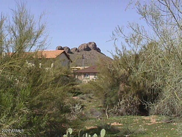 Easy build lot --- NO HOA!!!! Shy 1/4 acre! Great area of Gold Canyon with trails, restaurants, churches and park just around the corner! Paved street and alley access to the lot! SRP Power and  Water at property line. Zoned CR-5 / allows for development of Single Family Residence or Multi-Family Investment Property. Located across the street from Gold Canyon Golf Resort & Spa!