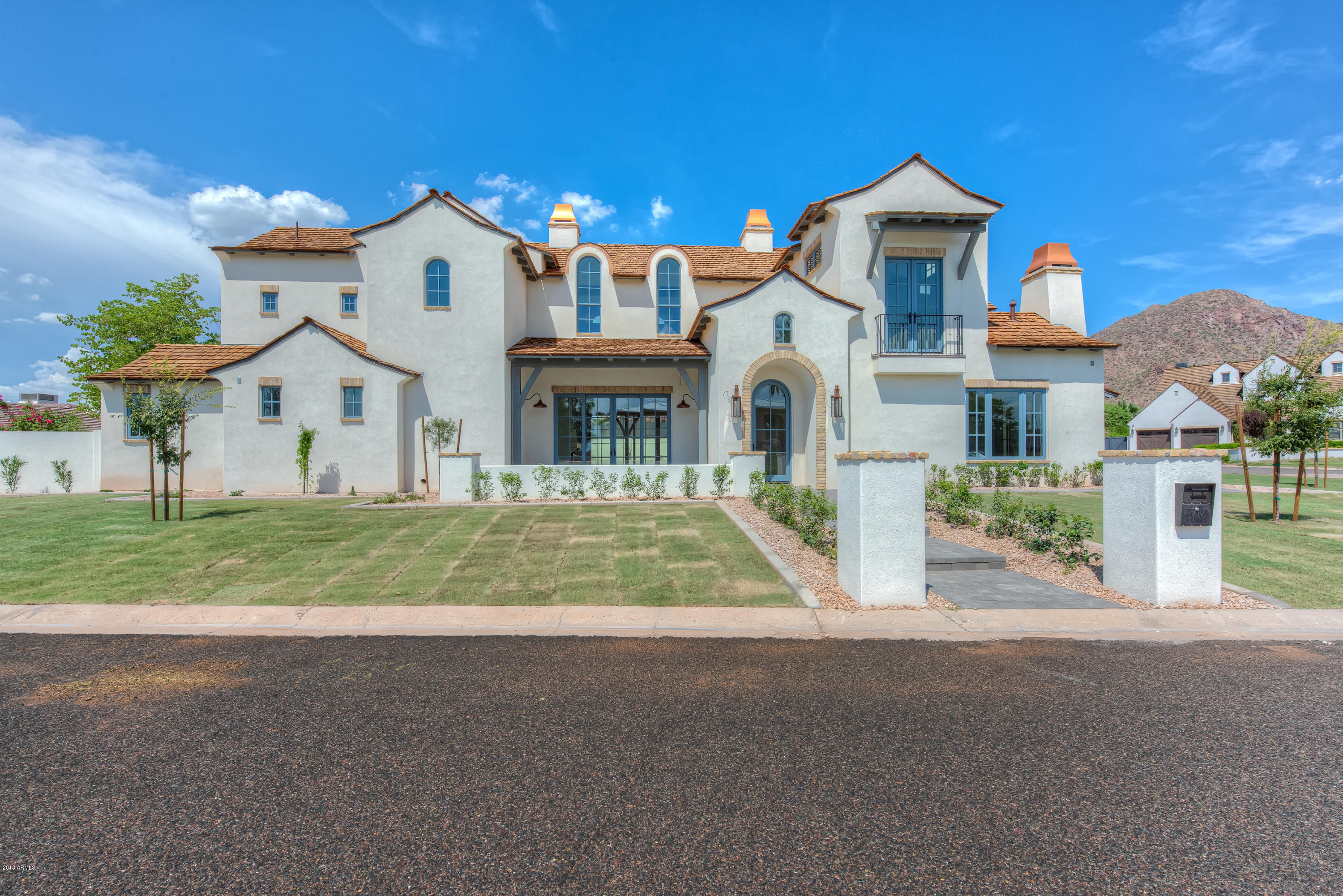 Introducing the French Chateau- another stunning property from Arcadia's premium builder, Uptown Construction! Property is now complete- interior designed by Jaimee Rose, architecture dsigned by Integrated Design. Exquisite design features include Custom Cabinets by Rysso Peters, chef's kitchen with a La Cornue Stove, soaring ceilings in the great room with immaculatly detailed beam-work, rose garden and private outdoor shower retreat off the master suite. Every detail has been thoughtfully planned - you will be in awe of the detail and level of finishes throughout. Call for more details!