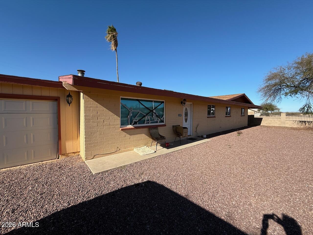 Great property in Toltec! Boasting a 1/3 acre lot, RV gate, 4-bedrooms, 2-bathrooms, 2-car garage, 1622 square feet of living space, and a PRIVATE POOL. Tile floor throughout. Newer kitchen cabinets. Fully fenced with front gate and side gates. Ceiling fans in bedrooms. Large back patio with separate storage room. No HOA. Property can use some TLC (pool, front window, garage door, drywall repairs). SHORT SALE.
