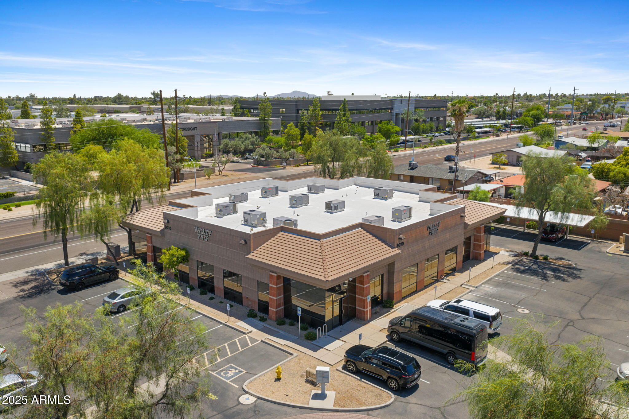Tremendous opportunity to own in the heart of Tempe's Commercial district. Building currently improved for private prep school. Possibilities are endless. Multiple offices, community meeting spaces, full kitchen, screening room, barbershop, podcast space and also a sounds studio. street frontage makes this the ideal location for your new business!