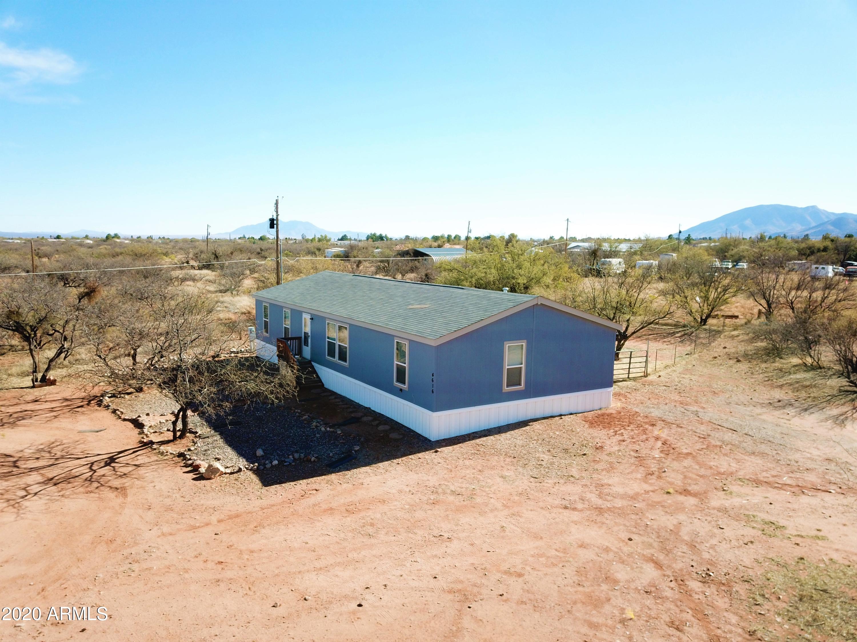 This 3 bedroom 2 bath home is located on approximately 1 acre. Well taken care of and ready for new owners. Enjoy the serenity of living ''out of town'' with only a few minute drive to anything that you need. Call us today for your showing.