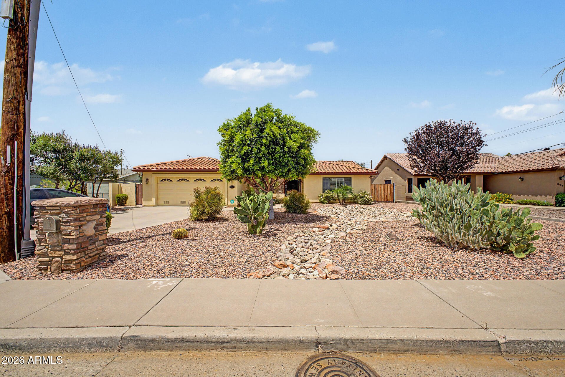 Beautifully upgraded home with exceptional indoor/outdoor living! Features include attractive stone front fascia, vaulted ceilings, tile and wood flooring throughout, and elegant shutters. The spacious kitchen offers granite countertops, tile backsplash, knotty wood cabinetry, stainless steel appliances, and dual ovens. The luxurious primary bath includes a custom tile shower surround with frameless glass enclosure. Additional upgrades include an R/O water system, soft water system, and garage storage cabinetry. Outside, enjoy an RV gate, detached workshop, stunning mountain views, and a gorgeous pebble tech pool creating the perfect backyard retreat.