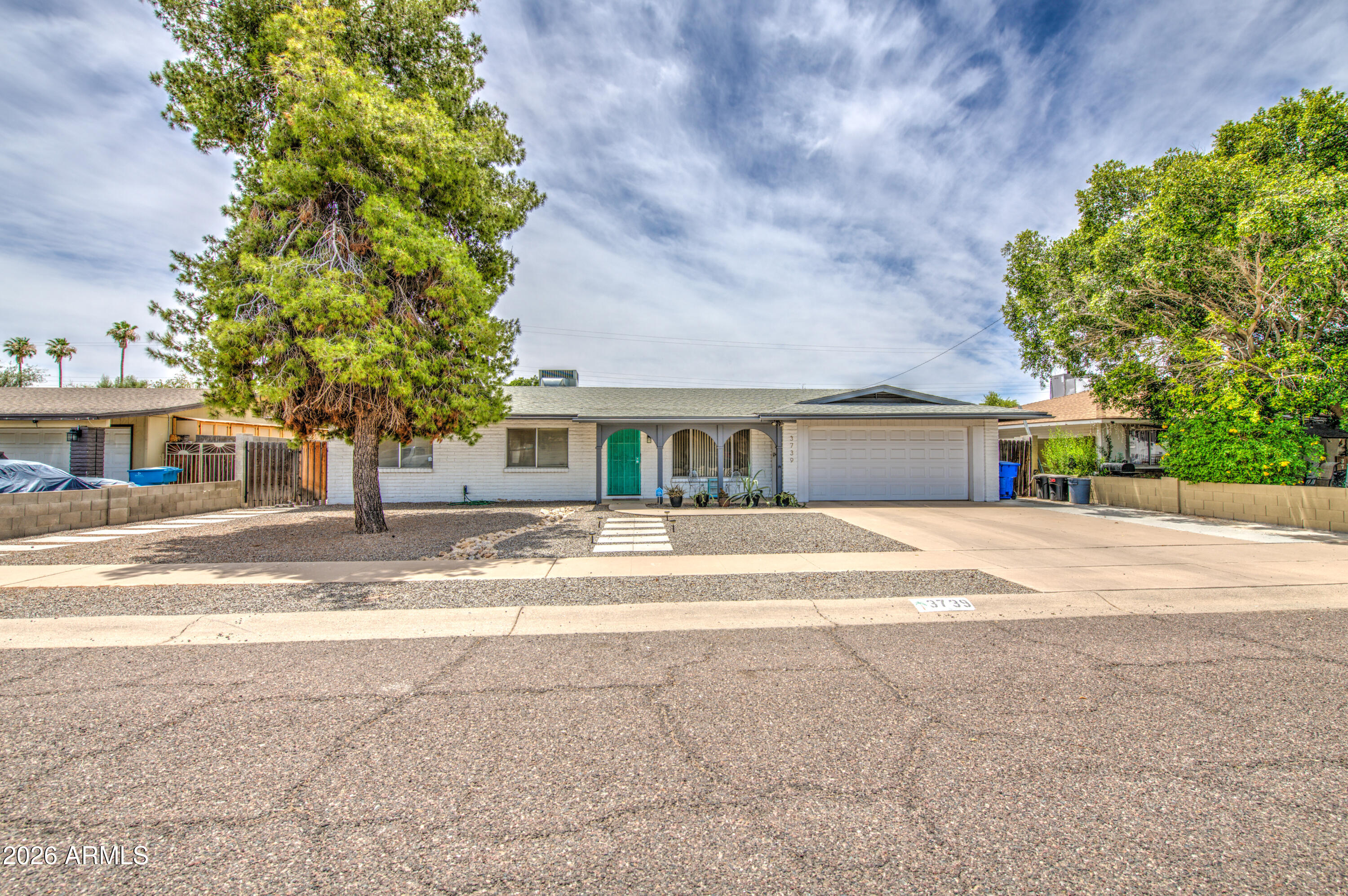 Charming 3-bedroom, 2-bath home with great curb appeal! This inviting residence features a 2-car garage, neutral tones, and stylish light fixtures throughout. The bright, open kitchen offers matching appliances and ample cabinet space. The spacious primary suite includes a full bath with dual sinks and a walk-in closet. Step outside to your private backyard oasis with a covered patio, grassy area, cozy seating space, and a sparkling fenced pool--perfect for relaxing or entertaining. Don't miss this wonderful opportunity to own a home that blends comfort, style, and outdoor living!