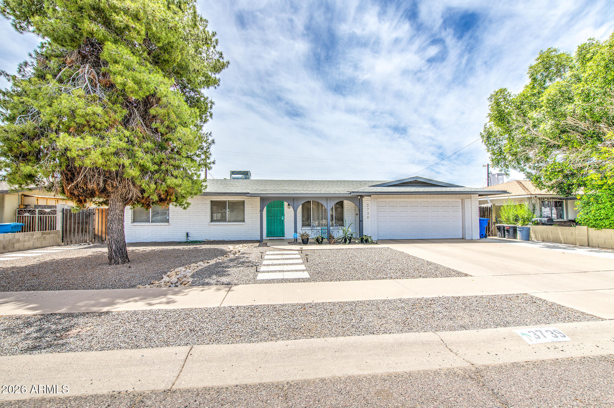 Charming 3-bedroom, 2-bath home with great curb appeal! This inviting residence features a 2-car garage, neutral tones, and stylish light fixtures throughout. The bright, open kitchen offers matching appliances and ample cabinet space. The spacious primary suite includes a full bath with dual sinks and a walk-in closet. Step outside to your private backyard oasis with a covered patio, grassy area, cozy seating space, and a sparkling fenced pool--perfect for relaxing or entertaining. Don't miss this wonderful opportunity to own a home that blends comfort, style, and outdoor living!