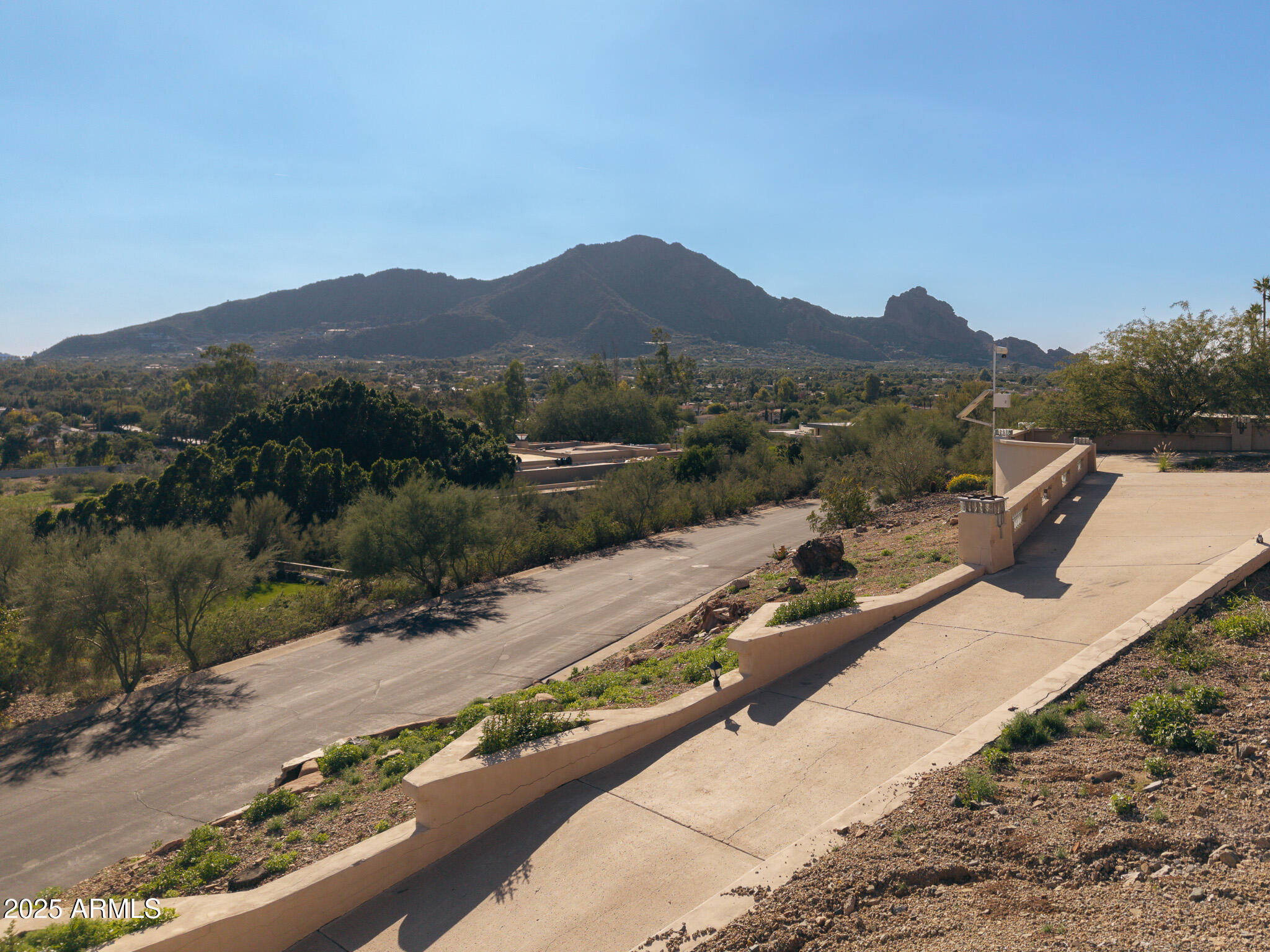 Claim your place on iconic Mummy Mountain with this spectacular 1+ acre homesite, showcasing breathtaking panoramas of both Camelback and Mummy Mountain. Surrounded by prestigious luxury estates and framed by dramatic natural beauty, this exceptional lot offers limitless potential. Craft your vision, elevate your lifestyle, and build the dream home you've always imagined—right here in the heart of Paradise Valley.