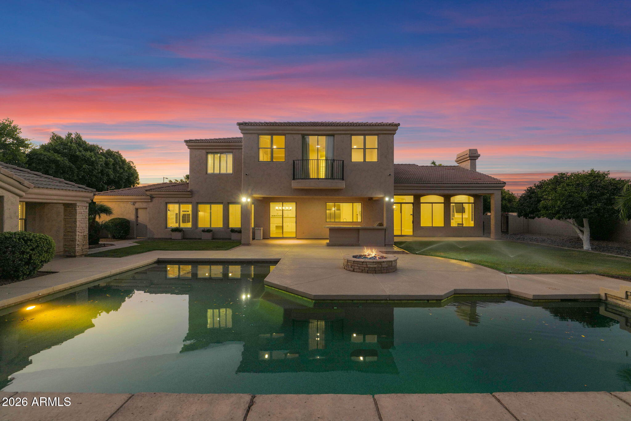 Discover the epitome of luxury living in the prestigious gated community of Arboleda. This exquisite 5 bedroom, 4.5 bathroom, two level, semi custom home is perfectly situated on a sprawling 6/10 acre lot right next to Arboleda Park, which contains sport courts, children's playground and ramada. Add to that a 1023 square foot separate casita with 2 additional bedrooms, 1 full bathroom, full kitchen, full laundry with wash sink, gas fire place, private outdoor porch, and a private garage with cabinets for storage. This residence caters to both comfort, sophistication and generational living possibilities. Come see all the recent upgrades. The gourmet kitchen is a chef's dream, featuring custom cabinets, built in side by side fridge/freezer, Asko dishwasher, Wolf double ovens, Wolf radiant cooktop, Wolf built in microwave, ice maker, quartz countertops, and sizeable eat in kitchen. Walk-in pantry. The oversized family room provides a welcoming space for relaxation and gatherings. Main floor also features a private en suite bedroom and a private office with built in book cases. 
Formal occasions are well accommodated in the combined formal living room with gas fire place and dining room, defined by 12 foot ceilings that enhance the home's spacious feel. Flooring throughout is a tasteful mix of new wood look plank tile and carpet, laying the foundation for your personal decor. Shiplap, wainscoting and crown molding add to the beauty of this home. The upstairs primary suite is a true retreat with sitting room space, two walk in closets and your own private balcony over looking the backyard. The primary bathroom features double counter sinks, a jetted tub, large shower with two side entrances and two private water closets for ultimate privacy. 3 additional bedrooms upstairs. One with its own bathroom and the other two are Jack and Jill with large bathroom in between, each having private sink/counter space. An additional bonus room offers flexibility for your lifestyle needs. Plantation shutters throughout. 3 car extended garage stays cool during Arizona summers with A/C split, built in cabinets for storage and epoxy flooring. And a 4th single car garage. Full exterior new paint. Dog run. Outdoor living is equally impressive. An outdoor oasis including a raised pergola, a diving board depth pool with child's play shelf, water features, spa and fire pit. Patio runs almost the length of the entire back of the house and provides shaded space for outdoor dining and leisure with a built in gas BBQ, burner, fridge and wash sink. Backyard includes multiple mature citrus trees (orange, lemon, grapefruit) all maintained with low-cost flood irrigation. Ample storage throughout the home adds to the convenience and appeal of this remarkable property. Located close to the 202 freeway, residents enjoy easy access to all parts of the Phoenix metro area, including PHX Sky Harbor. With top-rated schools and beautiful parks nearby, including the Mesa Tennis & Pickleball Center at Gene Autry Park, big league dreams, and Kensington Groves Park, this home is not just a residence but a lifestyle choice for those seeking the best in Mesa living.
