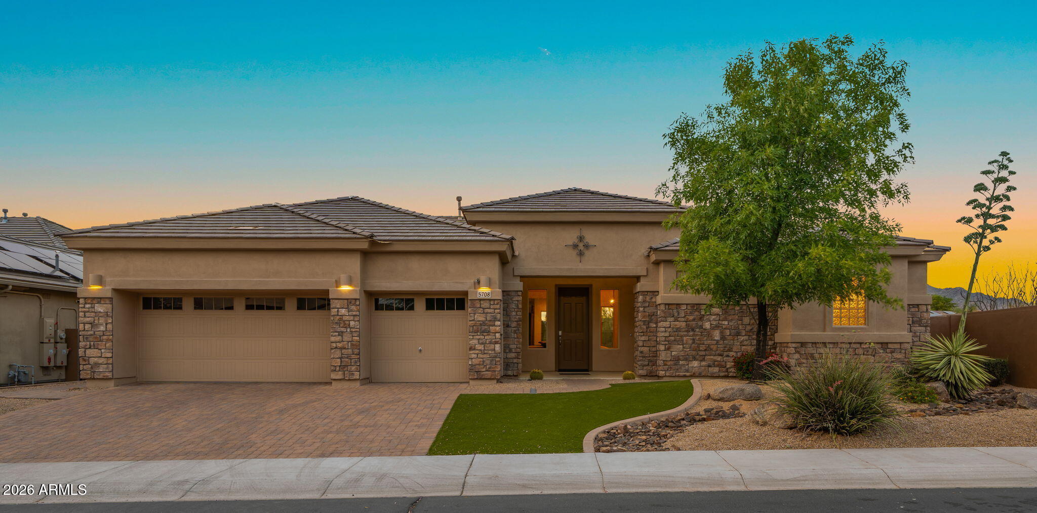 Magnificent Black Mountain masterpiece perfectly positioned on a premium, ultra-private lot with no immediate neighbors on three sides in a prestigious Lone Mountain gated community. Nestled within an abundance of natural desert open space, this exceptional neighborhood features both 3-acre and 10-acre community parks, scenic walking trails, and pristine sidewalks throughout. From the moment you enter, you are greeted by breathtaking, unobstructed Black Mountain views and a sophisticated, expansive open-concept floor plan drenched in natural light. The seamless flow highlights rich Brazilian hardwood floors and a designer chef's kitchen that transitions beautifully into the family room. Designed for elevated living, the residence features a highly desirable split primary suite that serves as a private sanctuary. The spectacular, north-facing resort-style backyard ensures comfortable, year-round enjoyment and endless vistas. Transition seamlessly to outdoor entertainment boasting a stunning pool, built-in decking, a custom gazebo, and a high-level misting system. With surround sound inside and out, every moment in this exceptional Sonoran Desert oasis is perfectly framed. A truly rare opportunity for the most discerning buyer.