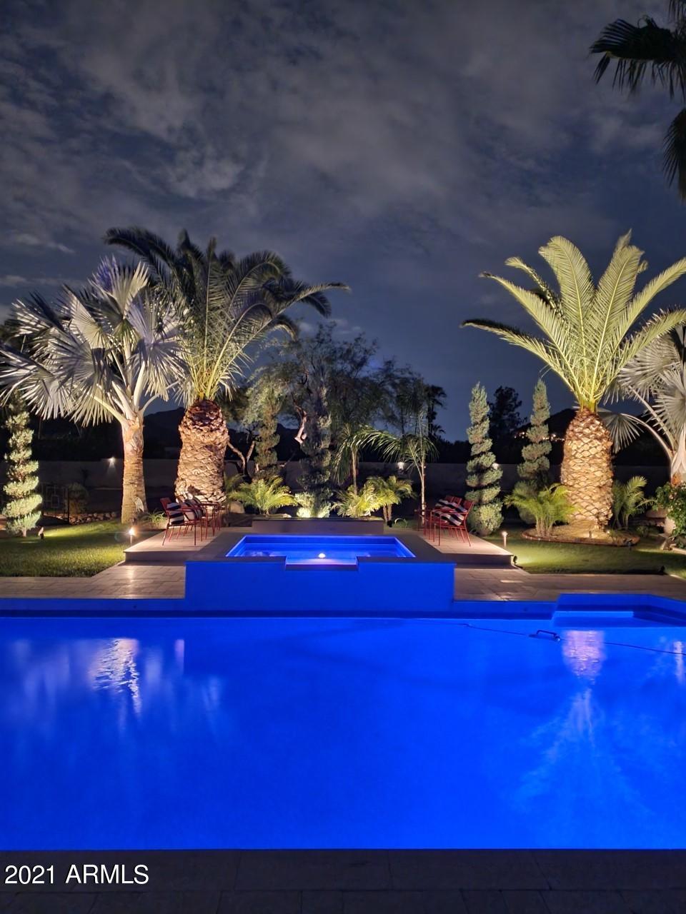 Back on market!, Buyer did not qualify! Never made it to inspection. A secluded privately gated 2.14 Acre ''Modern Farmhouse'' estate located in the most desirable location in Paradise Valley with Camelback, Mummy and Phx. Mtn. views.. Paradise Valley, is the most exclusive city in the state of Arizona.  Over the past few years, this home and property has been transformed into, as most have concurred, the most intimate home and most incredible resort backyard they have ever seen in their lifetime. It is a home where all kids. pets and adults will never want to leave. The photos are great, but do not do this home justice. This is the perfect split floor plan. There are 7 bedrooms and 4 bathrooms. The master  bedroom is as inviting as it gets. Down the hall from the master bedroom is either another master or guest quarters, The kitchen offers cooking options: 1. The latest and greatest 36" Bosch induction cook top has been installed. It boils water twice as fast as gas and is 100% child proof! 2. If Induction cooking is not for you, natural gas is stubbed up to the kitchen. 3.If you prefer electric, that is an easy drop in.
There are two Bosch wall ovens, a Bosch dishwasher, Frigidaire refrigerator/freezer and microwave. We are currently awaiting our self closing easy glide mechanisms for our cabinet drawers. The book matched quartz in the kitchen is a true affirmation as to the quality of this redesign. All of the gray veins in the quartz are contiguous. The living room and great room have their own individuality. Beams, distressed eclectic brick and 3D porcelain with a gas fireplace are all popping to the eye. On the opposite side of the home there are three inviting bedrooms, all with walk in closets. A great sized functional laundry room is integrated nicely with the three bedrooms. Then, there is a stair case that separates the main level to the guest level or the kids level. The lower level offers a game room. great room, fireplace, 2 bedrooms, 1 bathroom, and a separate room for storage or to be used as a kitchenette.
Now, stepping out to the most amazing backyard in which one will not find anywhere: The covered patio ceiling incorporates reclaimed barn wood with ceiling fans that can be controlled with a phone app. A one touch heated diving pool and spa encased in limestone that are temperature controlled! A "Resort Style" cabana to the left of the pool. Practice putting green to the left of the cabana. Pitch and put with three sand traps to the south of the putting green. Massive grass play areas all over this sprawling manicured property. You will never have to take your dog for a walk again. Your kids can ride the trails in the backyard and around the home. 
Located right outside the indoor kitchen is a limestone outdoor kitchen with, BBQ, storage, beverage center and ice storage. 
A new concrete roof with 90 LB underlayment was recently installed. The roof has a 20 year warranty. This home and property is amazing and truly one of a kind! There is a site plan downloaded under the document tab. This site plan was created two years ago for the purpose to enable SW Gas to bring gas to the home and property. Work permits on this home can be viewed on The Town of Paradise Valley website. One can see from the site plan and the drone shot that there is plenty of room to add additional garage accommodations, a separate guest house, a sport court, a tennis court or virtually anything else your heart desires!
Like Luxury Homes DBA Like Renovation is a "Design Company". Like Luxury Homes has built homes from $2M to $8.2M. Like Renovation has redesigned 34 homes within the past nine years. All of the details of this redesign are unique and the applications of the materials are unique!