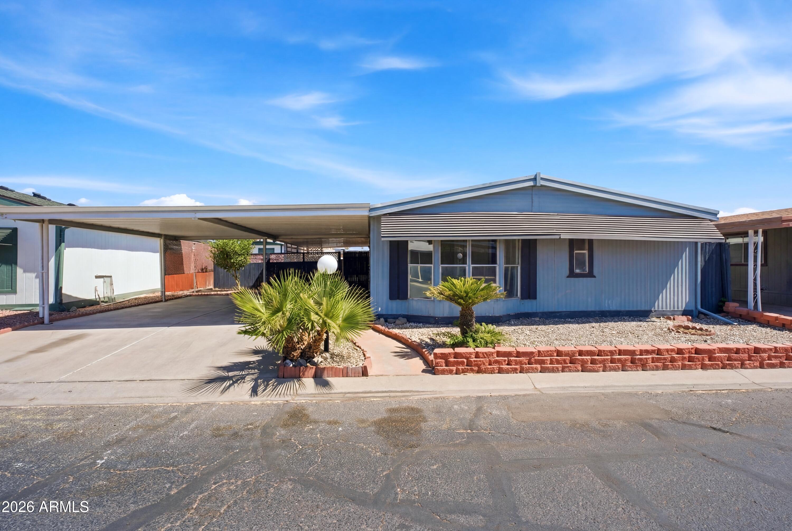Stunning fully remodeled double-wide in desirable Polynesian Village! This spacious 3BD/2BA, 1,550 sq ft home checks every box -- brand-new A/C, new dryer, gorgeous quartz countertops, and all-new cabinetry throughout. Light, bright, and completely move-in ready with high-end finishes you won't expect at this price point.
Enjoy one of the LARGEST backyards in the community, complete with two storage sheds and an expanded 2-car carport. Prime location within the park puts you just steps from the pool, gym, community center, and playground. Easy highway access makes commuting a breeze. Low property taxes and one of the lowest lot rents in the entire Valley at just $740/mo. Don't miss this one -- it won't last!