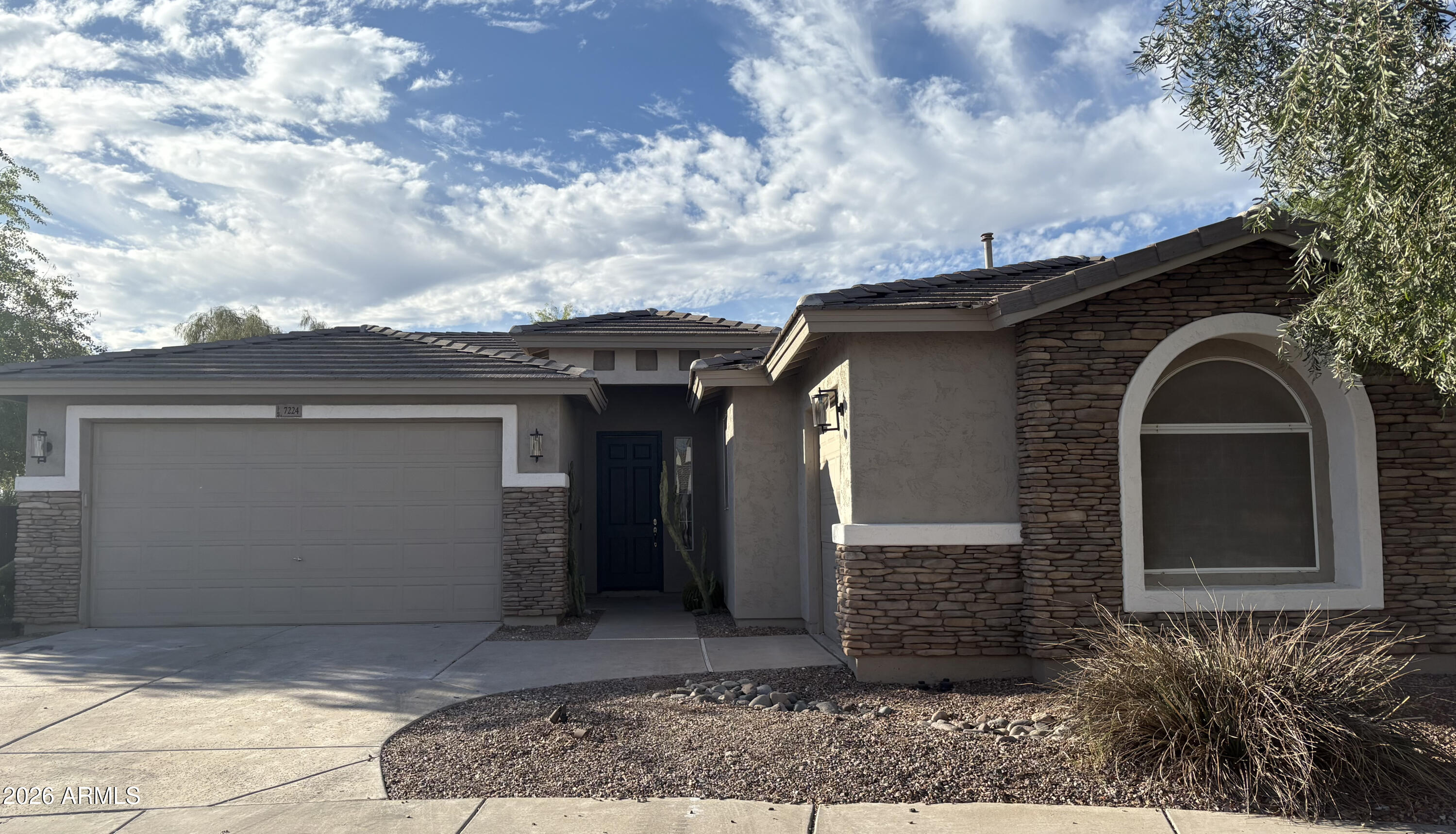 Modern designer home in South Mountain, Phoenix--fully remodeled with over $100K in upgrades. This single-story, 5-bed, 2-bath home sits on a 0.31-acre cul-de-sac lot with an RV gate and dual primary suites, ideal for guests. Features include 10-ft ceilings (even in the garage), upgraded flooring, soft water system, and an open layout. The chef's kitchen boasts GE Monogram appliances, soft-close cabinets, and a large island. Enjoy a resort-style backyard with a heated pool, zero-edge spa, pergola lounge, fire feature, turf, and covered patio. Extended 3-car garage with AC, epoxy floors, storage, and EV charger. Prime location near Sky Harbor, Loop 202, hiking, dining, and more.