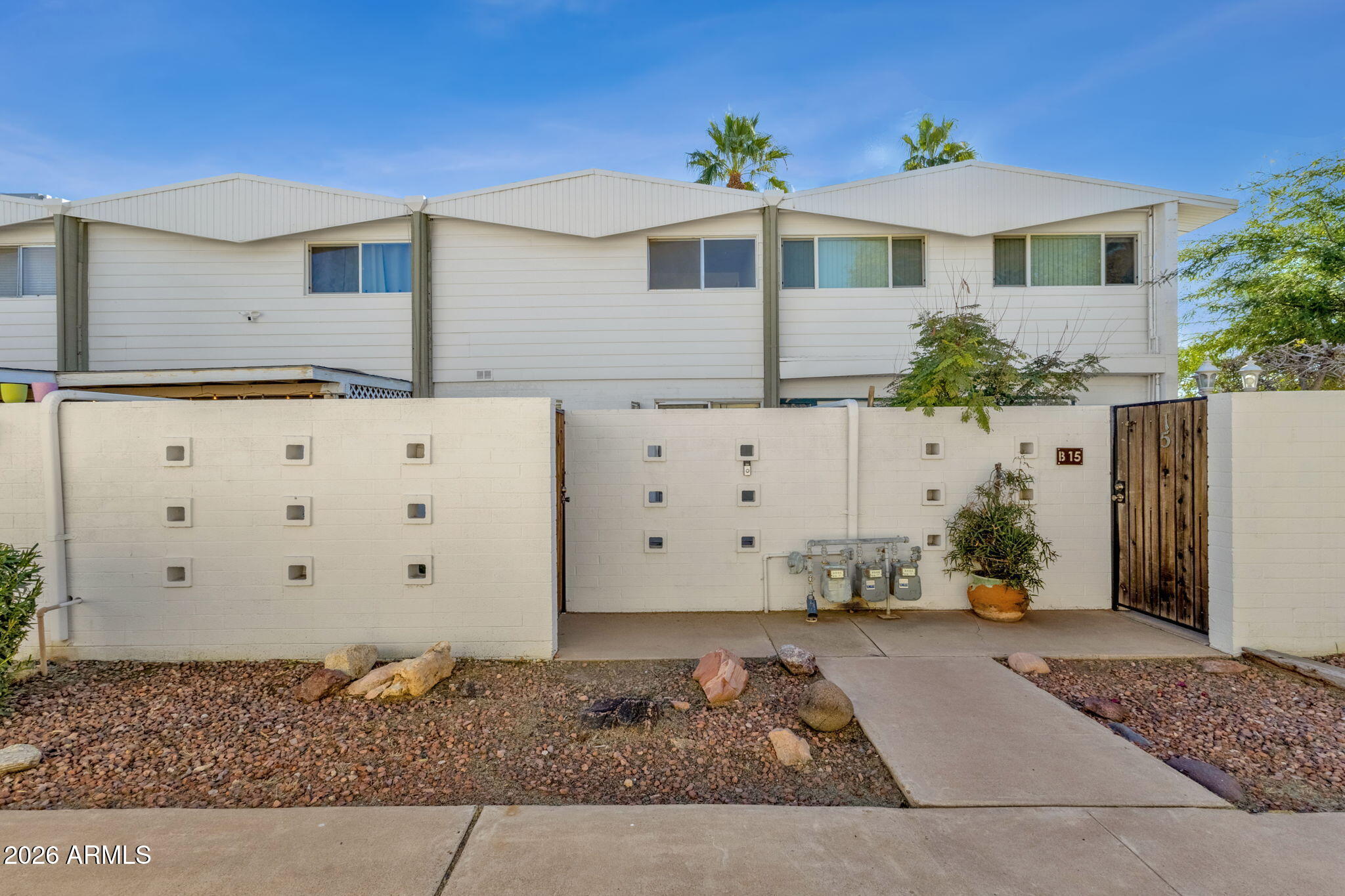 Welcome to your move-in ready 3 bed/1 Scottsdale townhouse. Easy living where utilities and maintenance of HVAC and water heater systems are covered by the HOA. It has a private courtyard, large windows that bring in the natural light that open up to a grass area. Close to the Loop 101 & 202 Freeways, Tempe Market, and shopping and dining options. The co-op must be cash only, no rentals, and approved by the board.
