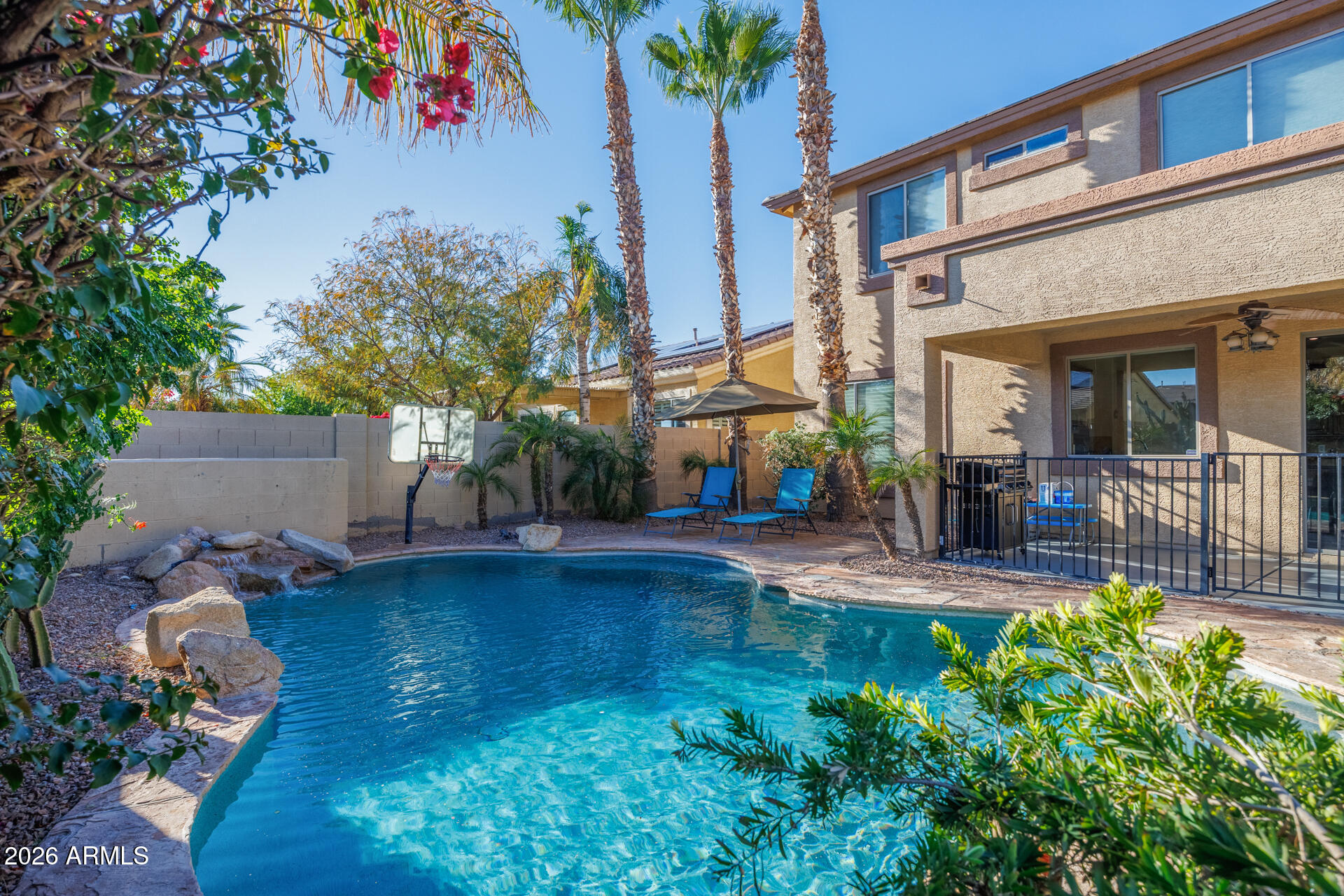 This beautiful home with a pool is located in the highly sought-after Villago subdivision. A grand entry welcomes you into a versatile floor plan featuring 4 bedrooms and 3.5 bathrooms. Inside you'll find a spacious living room, den, loft, flex space, and 3 car garage - offering endless possibilities to fit your needs. The backyard is perfect for relaxation, complete with a heated pool and thoughtfully designed landscaping. The kitchen boasts granite countertops, a gas stove, ample cabinetry, and a blend of tile and hardwood flooring. New LVP flooring was installed upstairs, in the bonus room, and in the formal living area in 2022. Other upgrades from 2022 include new pool pump + filter, new water heater, and new fridge (2023). Beat the heat this summer - poolside!