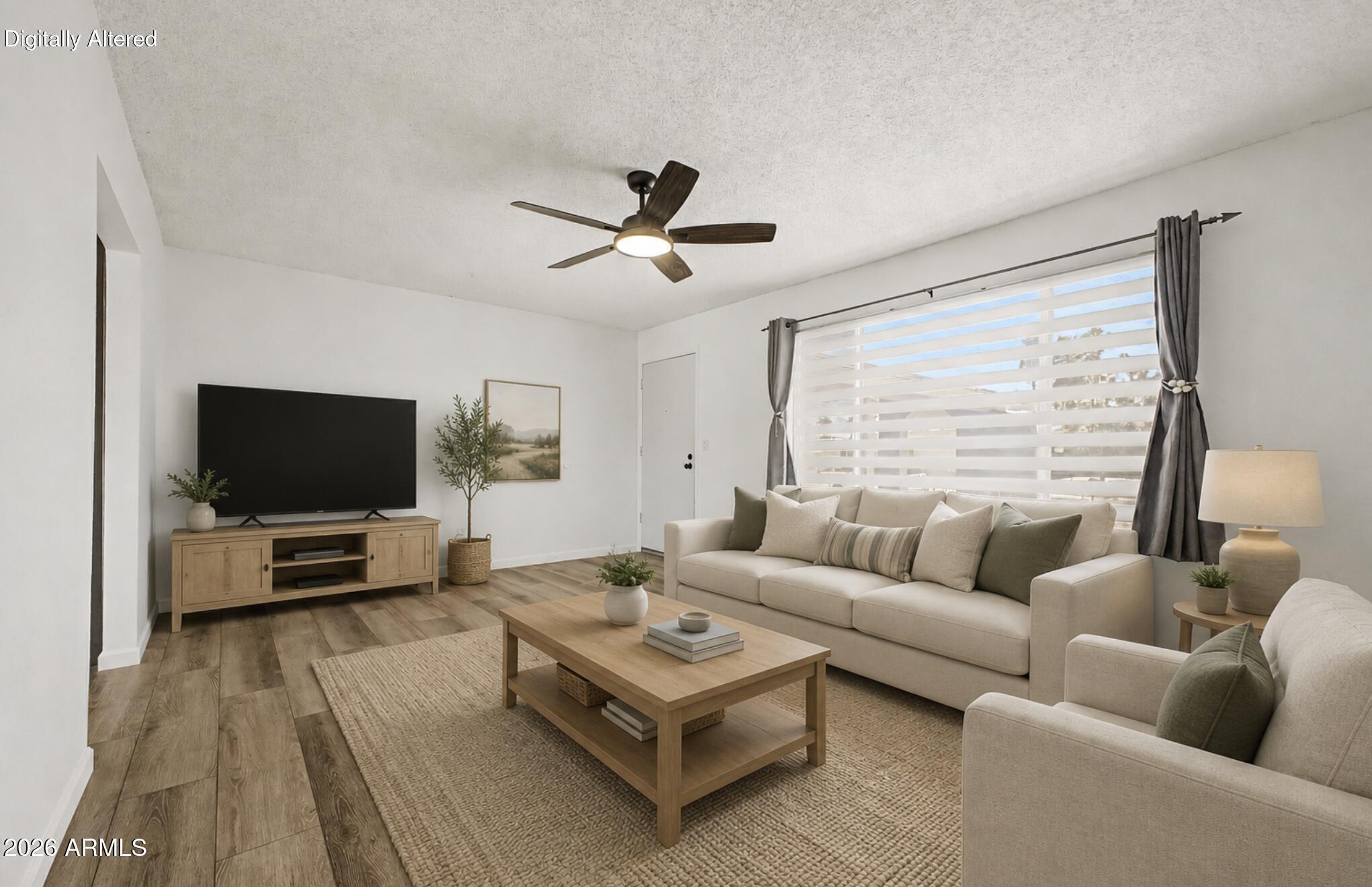 Assumable VA loan at an incredible 2.25% interest rate, a rare opportunity in today's market! Welcome to 926 W Apollo Avenue, a hard-to-find Tempe gem situated on a spacious 8,500+ sq ft corner lot with NO HOA, giving you the freedom and flexibility you've been searching for. From the moment you arrive, you'll appreciate the pride of ownership, generous lot size, and unbeatable central location.

Step inside to a warm and inviting family room that offers the perfect space to relax or gather with friends and family. Continue into the beautifully updated kitchen featuring a large island, sleek quartz countertops, upgraded cabinetry, built-in microwave, and plenty of prep and storage space for everyday living and entertaining alike. Just off the kitchen, the oversized formal dining area creates the ideal setup for hosting!

The home features stylish wood-look flooring in main living areas, adding both warmth and durability. Retreat to the XL primary suite filled with natural light and plenty of room to unwind. Spacious secondary bedrooms provide flexibility for guests, a home office, gym, or growing household needs. The interior has also been freshly painted, giving the home a clean and modern feel throughout.

Outside, enjoy the benefits of the oversized corner lot with an RV gate, abundant parking, and endless potential to create your dream backyard oasis. Whether you envision a pool, workshop, garden, or entertaining space, this property gives you room to make it happen.

Conveniently located near the I-10 freeway, commuting anywhere in the Valley is quick and easy. Just under 5 miles from Arizona State University, minutes from shopping, dining, parks, and entertainment, and only 12 minutes to Phoenix Sky Harbor International Airport. Opportunities like this in Tempe - especially with an assumable 2.25% VA loan and no HOA - are incredibly rare!