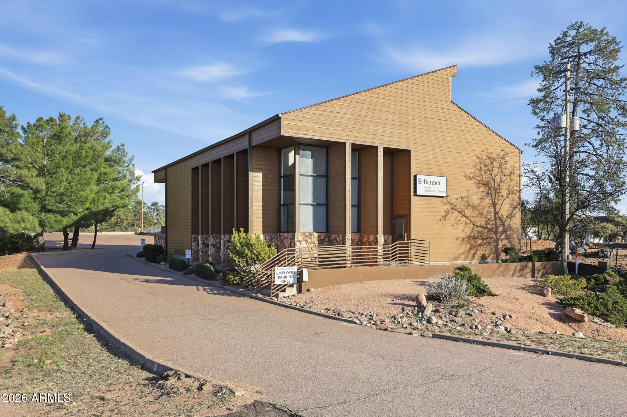Exceptional C-2 commercial opportunity with outstanding highway frontage and visibility. This 5,150 ± SF freestanding building on a half-acre parcel is ideally suited for professional office, retail or service-oriented businesses seeking strong exposure and convenient access, it could also be a special event space. Located next door to a new hotel currently under construction, the property stands to benefit from increased traffic and economic activity. The property is within walking distance to nearby restaurants and services, benefiting both customers and employees. The ground floor is ADA compliant, and the flexible floor plan allows for a variety of potential uses (subject to zoning). With 48 on-site parking spaces, the site easily accommodates staff, clients, and event traffic. The current set up downstairs has a reception area, 2 conference rooms, 2 offices and a large event room with 2 restrooms and a kitchen/breakroom plus storage room. Upstairs has a separate entrance from outside with a reception area, conference room, 4 offices, one restroom and a storage room. Major capital improvements have already been completed, including a new roof (2021) and new engineered siding (2023), reducing near-term capital expense.
Offered well below replacement cost.