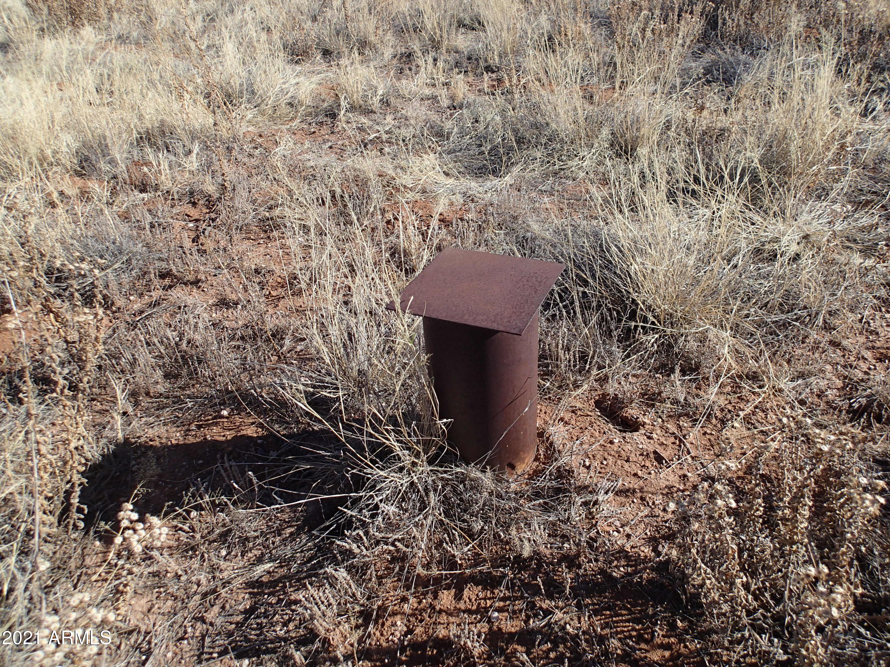 PRIVATE WELL AND ELEC TO THE LOT LINE!!! This 4 Acre parcel is located on a great gravel road less than 1/4 mile to Paved road. Great Mountain Views all around. Several very nice Sitebuilt homes in the area. NO Manf homes. Underground Electric. Private Drilled Well (no pump/tanks/elec). NO HOA. Call agent for  full details.