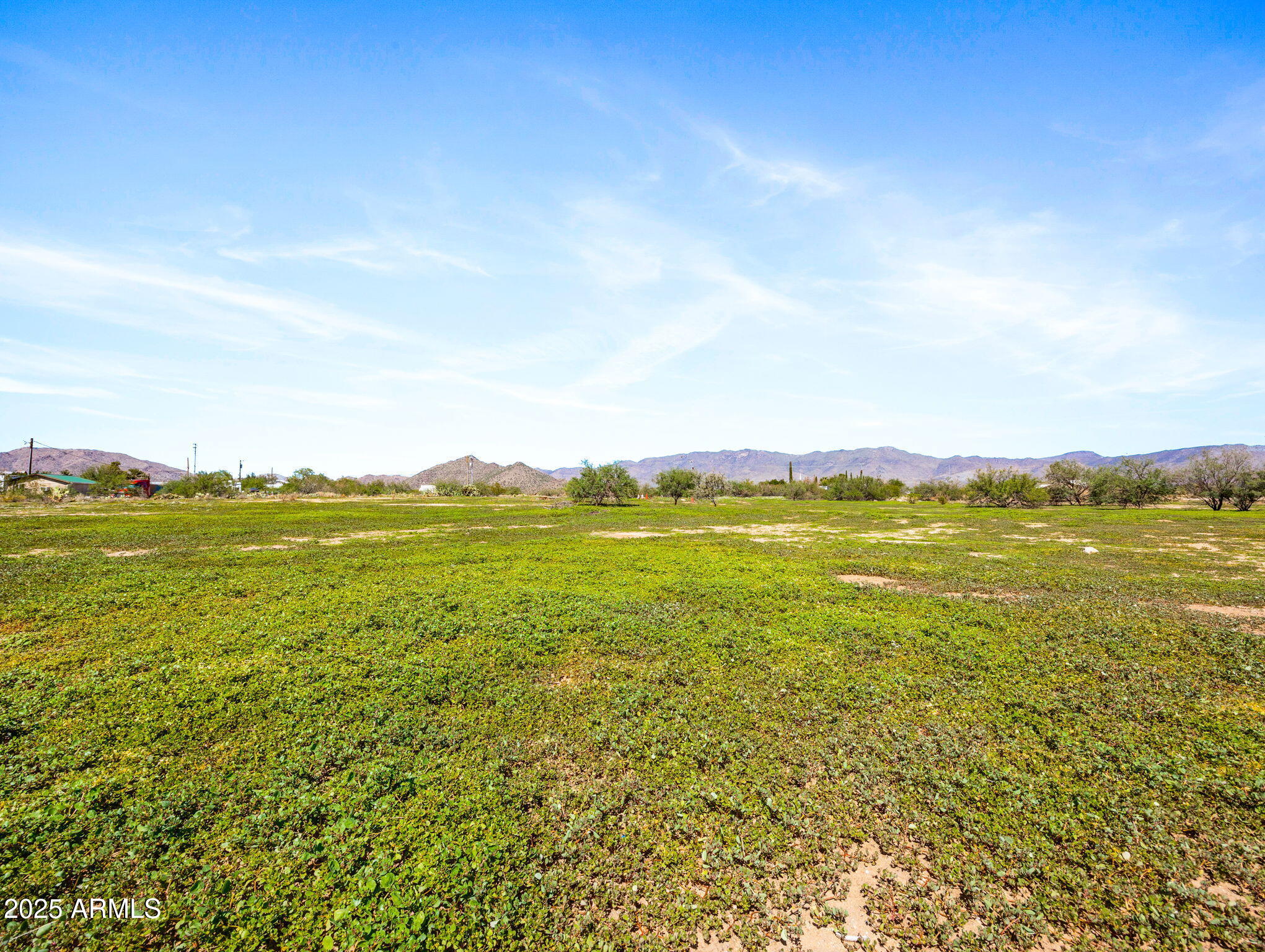MULTI-ZONE PARCEL ON HIGHWAY 89. Amazing opportunity to own Highway frontage with several use options. Electric and water already on site. This property includes both residential and commercial zoning (R1L-35, R2-3 and C2-1) and is ready for development. Possibilities include single family residential homes and multifamily dwellings such as apartments and townhomes. (site built only) Commercial potential includes retail or wholesale sales & service business ventures, processing / assembly facilities and outdoor storage to include RVs. Consider the proximity to Wickenburg, which is known as the 'Roping Capital of the World'. With such level & usable land, it's a viable Barrel & Roping option as well. ** CLICK MORE FOR ADDITIONAL INFORMATION ** Strategically located on the Wickenburg to Prescott corridor, visibility and traffic are high. With 8+ acres, businesses can be nearer the highway or residential homes can be set further back. Huge mountain views. Access to state land. Well priced!
