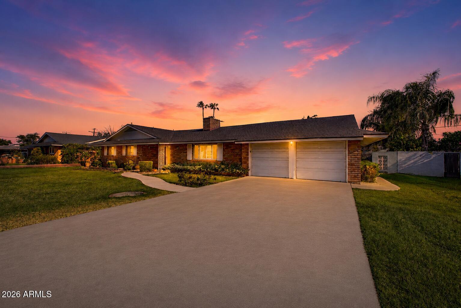 One mile from ASU, zero HOA, and sitting on a 12,114 square foot lot - this is the kind of combination investors and homeowners alike search for and rarely find. This 5-bedroom, 3,260-square-foot home built in 1960 offers space to spread out, with a stone fireplace anchoring the family room, an oversized great room, a separate front living room, and a dedicated dining room, giving the layout several distinct areas to live, work, and entertain in rather than one open footprint. The primary bedroom and split bedroom have already been updated, paired with new quartz kitchen countertops and a brand-new 2026 roof, so the major-ticket items are handled. The remaining three bedrooms are ready for new flooring and paint, offering room to customize finishes to your own taste or add value through further updates. A 110 square foot walk-in pantry adds a level of storage that's uncommon in a home of this era. Outside, mature landscaping and a covered patio complete the 2-car garage lot. Located minutes from ASU, shopping, dining, and major freeway access, this is a rare no-HOA opportunity in a location where proximity to campus consistently drives strong demand.