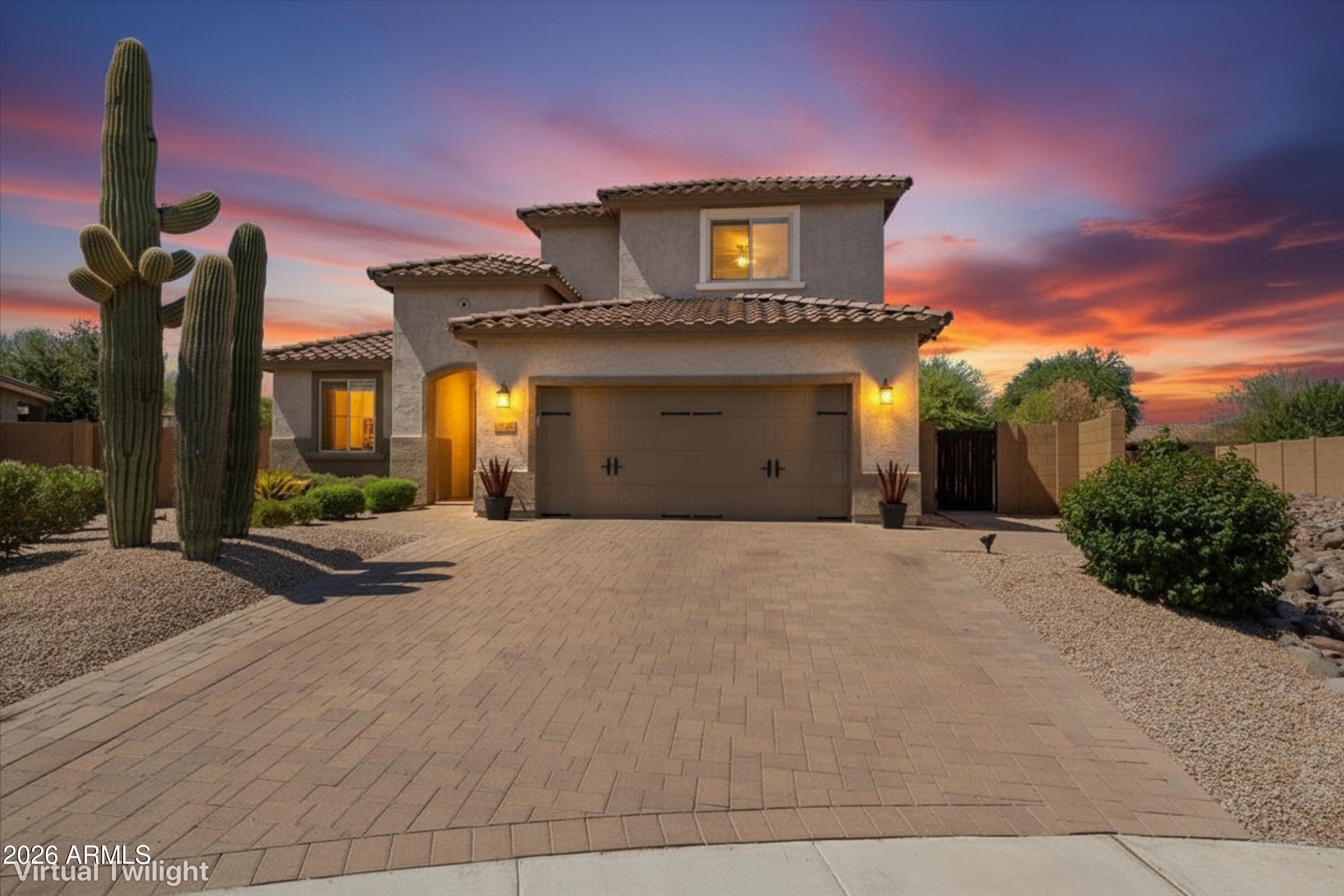 THE BEST HOME MONEY CAN BUY IN 85143! This custom-finished model home was built for those who expect exceptional design, luxury finishes, and the privacy that's nearly impossible to find. Set on a premium ¼-acre lot with no neighbors behind, this entertainer's dream features a resort-style pool, putting green, pergola, and an outdoor dining space made for unforgettable evenings. Inside, enjoy 5 bedrooms, 5 bathrooms, soaring 20-foot ceilings, plus a dedicated den and office. The chef's kitchen is every bit as impressive as the backyard. Located in Circle Cross Ranch with parks, trails, and community events, plus the highly regarded K-8 STEM Academy offering robotics and coding just minutes away. Luxury, space, and location rarely come together like this.