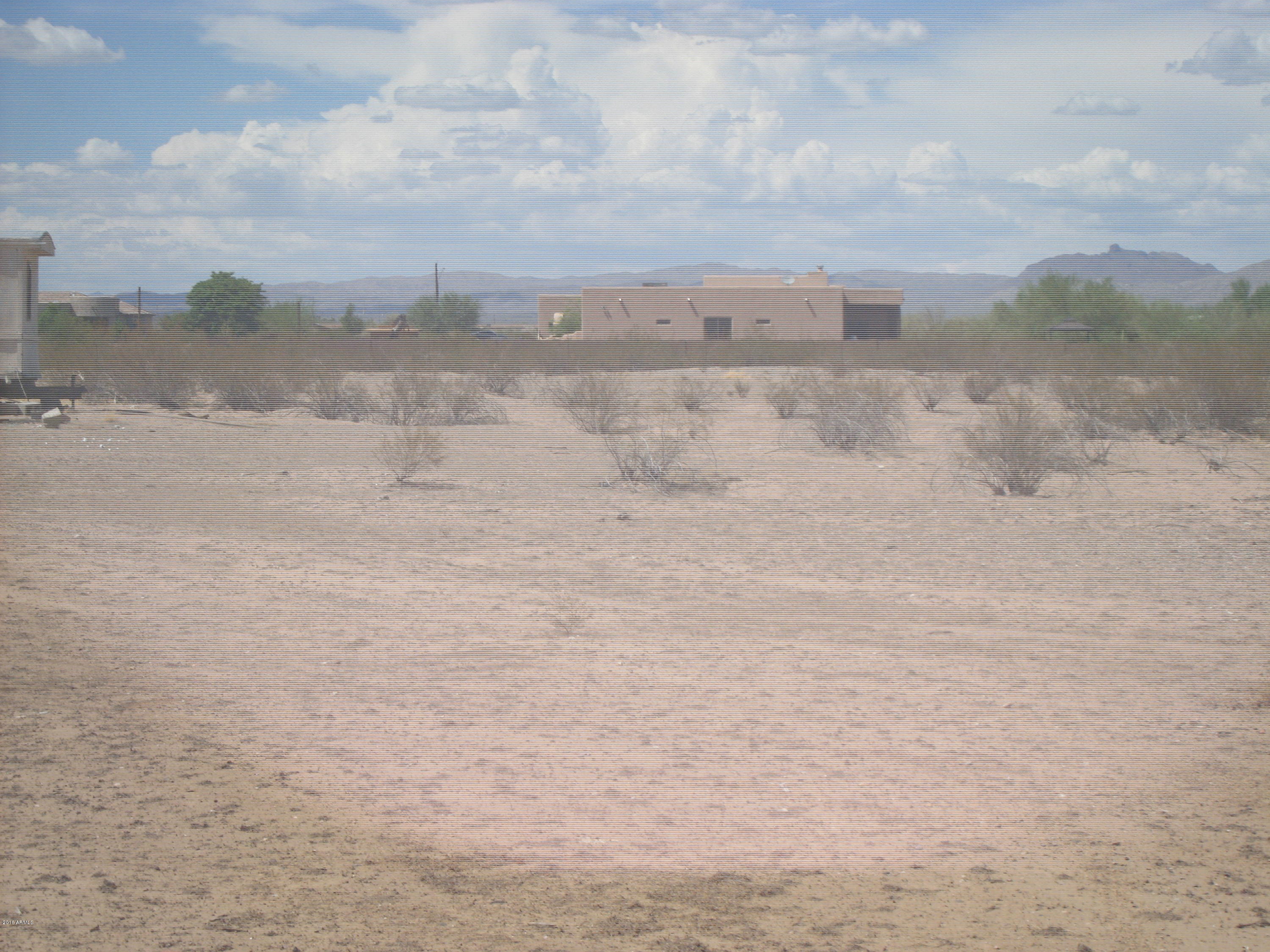 NO HOA! Don't miss this incredible opportunity to own over an acre of land. This spacious parcel offers a shared well and is ideally located just minutes from Highway 60, providing easy access to nearby amenities and travel routes. Whether you're looking to invest or build your dream home, this property offers endless potential in a growing area. Owner willing to sell the other 3 adjacent lots.