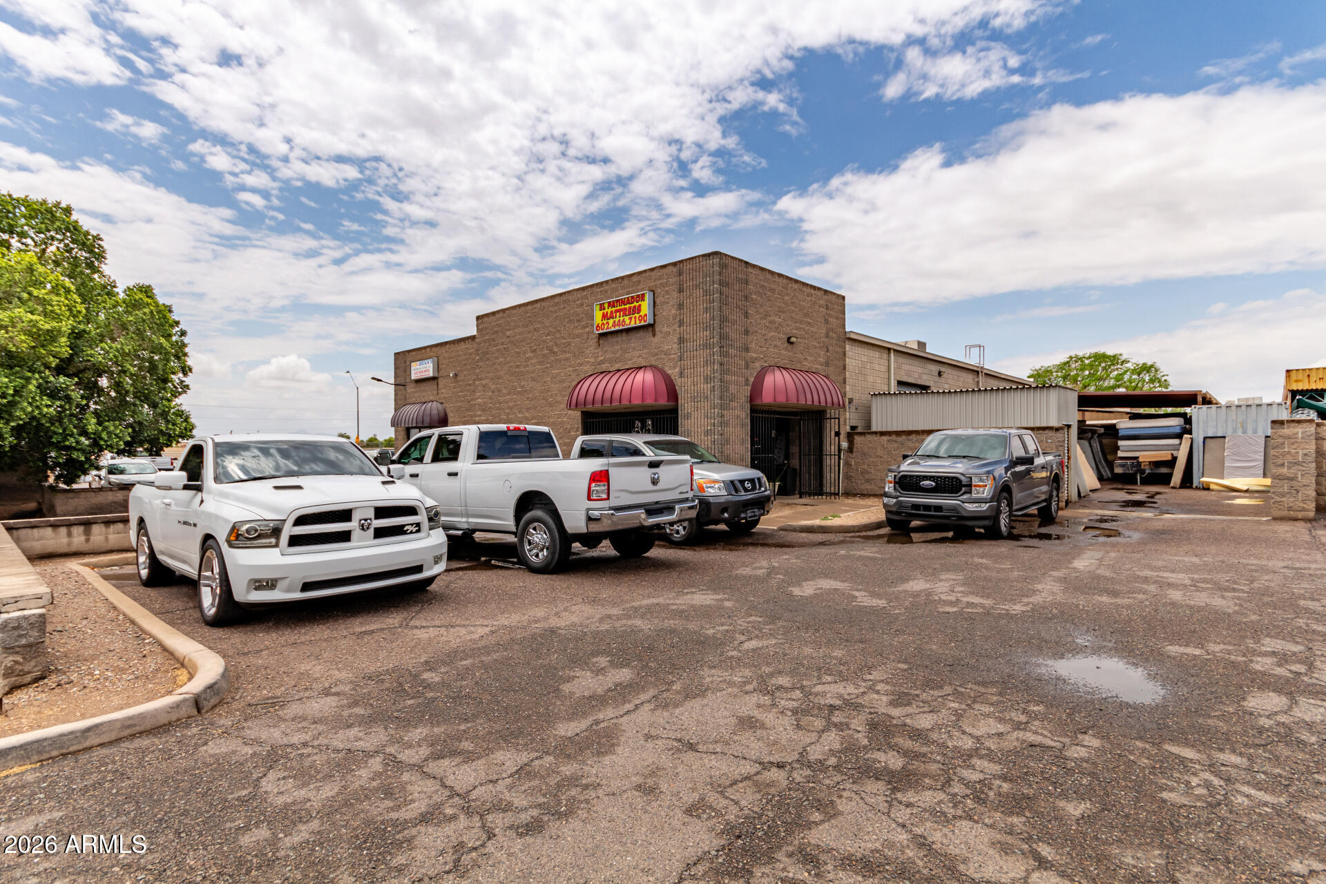 Reception, 1 Office, 1 Restroom, Dry Storage, Kitchenette, Three (3) 10' x 12' Grade Level Doors, 3-Phase Power, Paint Booth, 2 Cargo
Containers for Storage, 1 Storage Shed Structure, Canopy Area,  Mezzanine area, Secured Gated Yard. Approx. 1/2 a mile from 60 Freeway/Grand Ave, HVAC in Office Area
and Swamp Cooler Warehouse.