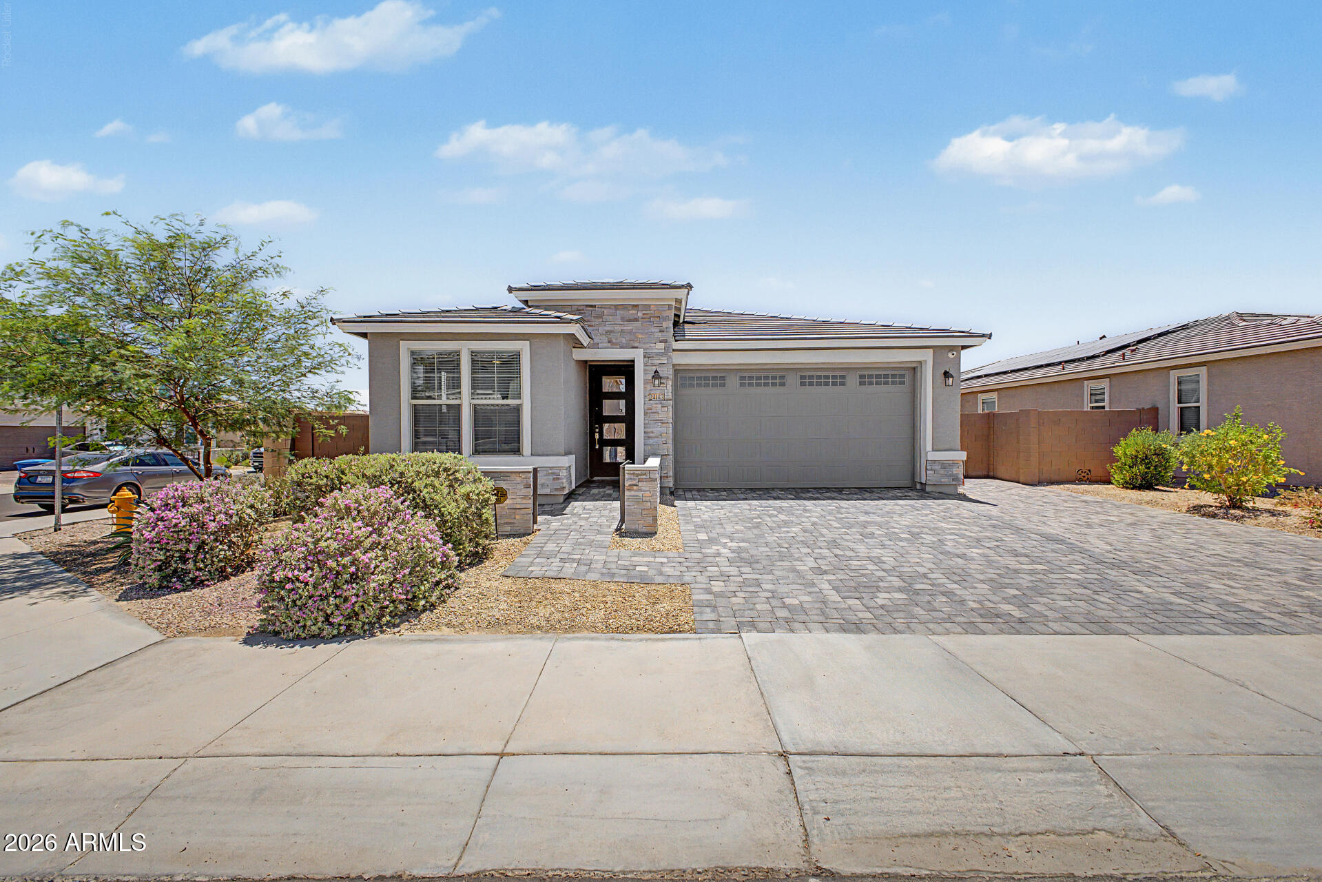 The Complete Package: Newer Construction, Corner Lot, Premium Upgrades. This exceptional 4-bedroom plus  flex room, 3-bath home offers the perfect combination of modern design, functionality, and move-in-ready convenience. Situated on a desirable corner lot, the open-concept floor plan showcases a spacious kitchen featuring quartz countertops, upgraded cabinetry, under-cabinet lighting, and seamless flow into the living and dining areas ideal for everyday living and entertaining.  Thoughtfully enhanced beyond builder standards, the home includes a built-in theater system and backyard speaker system, creating an elevated indoor-outdoor living experience. The well designed layout offers generous living spaces, comfortable bedrooms, and stylish finishes throughout.