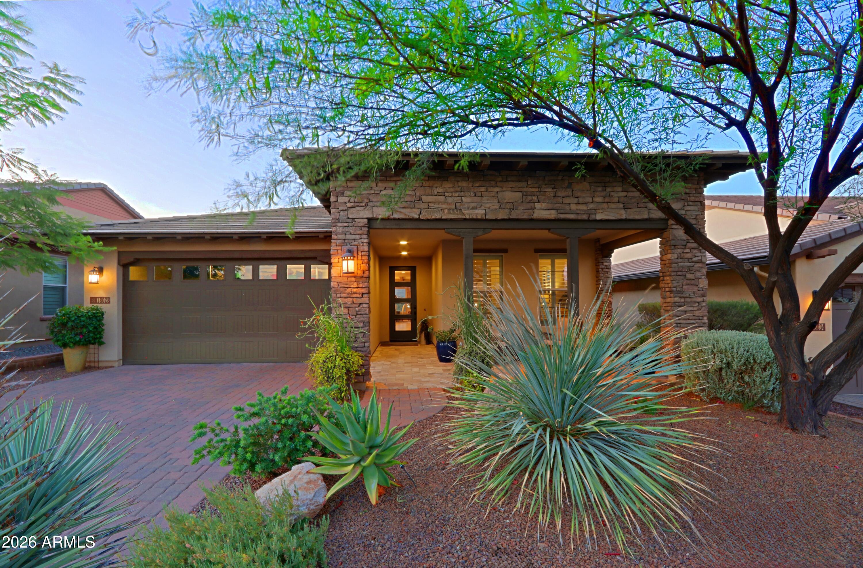Looking for breathtaking mountain and golf course views? Look no further! This pristine Nice model is ideally situated within the highly sought-after Trilogy at Verde River Golf & Social Club, offering exceptional views overlooking the 12th hole of the private Tom Lehman-designed championship golf course. The beautifully appointed 2 bedroom, 2 bath reisidence showcases an array of designer upgrades including engineered wood flooring, custom cabinerty, GE Monogram appliances, expansive granite countertop, and a spacious open concept great room designed for both comfortable living and effortless entertaining. The wall of sliding glass doors opens to an inviting outdoor living space featuring a built-in BBQ, mature landscaping, and a generous covered patio where you can injoy spectacular mountain vistas, golf course views and Arizons's stunning sunsets. The private backyard creates the perfect oasis for relaxing or hosting guests. The primary suite is a true retreat offering picturesque mountain views, dual vanities, and a large walk-in closet. Additional highlights include an extended garage, overhead storage, reverse osmosis water system, mature landscaping, and a desirable location within one of the area's premier golf and lifestyle communities. Experience resort-style lliving at its finest in Trilogy at Verde River Golf & Social Club.