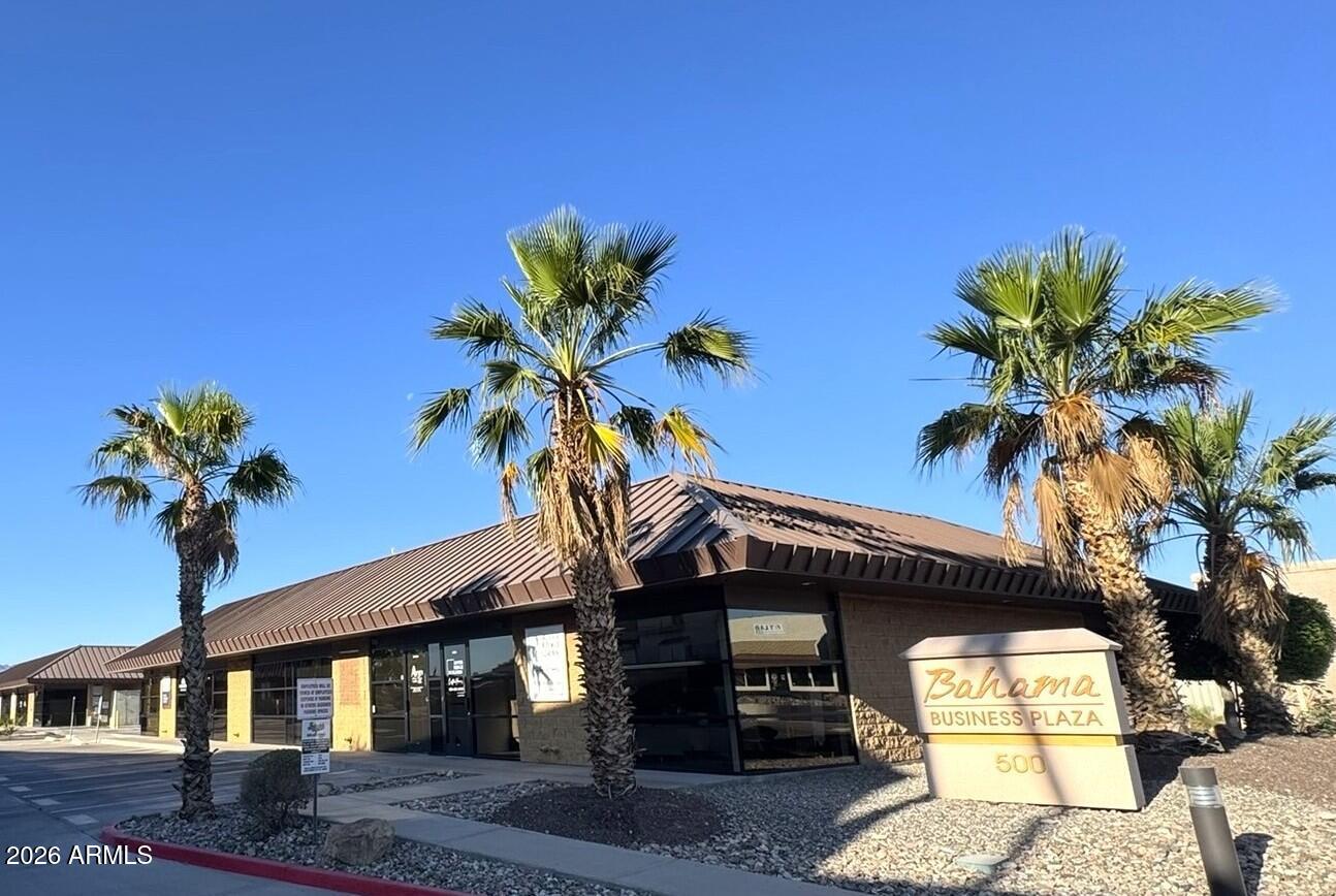 Lake View, Close Proximity to Downtown Havasu, Professional Office Building w/4 Offices, Upscale Kitchen, Loaded w/High Quality Built-In Cabinets in 2 of the offices & Kitchen. HOA Commercial Condo means very well kept grounds. Cement parking lot instead of pavement. 1 Covered parking spot, 2 reserved uncovered spots in front & many other spots that are not reserved. Two year old commercial HVAC. Move in ready, clean, fresh paint, granite countertops, Hickory wood 8' doors, LED lighting, wired for alarm, Travertine floors & the list goes on. Surrounded by other professional businesses. Priced right for easy/quick lease. Check out the pictures & get here before this is discovered. For Sale & For Lease, which ever occurs first.